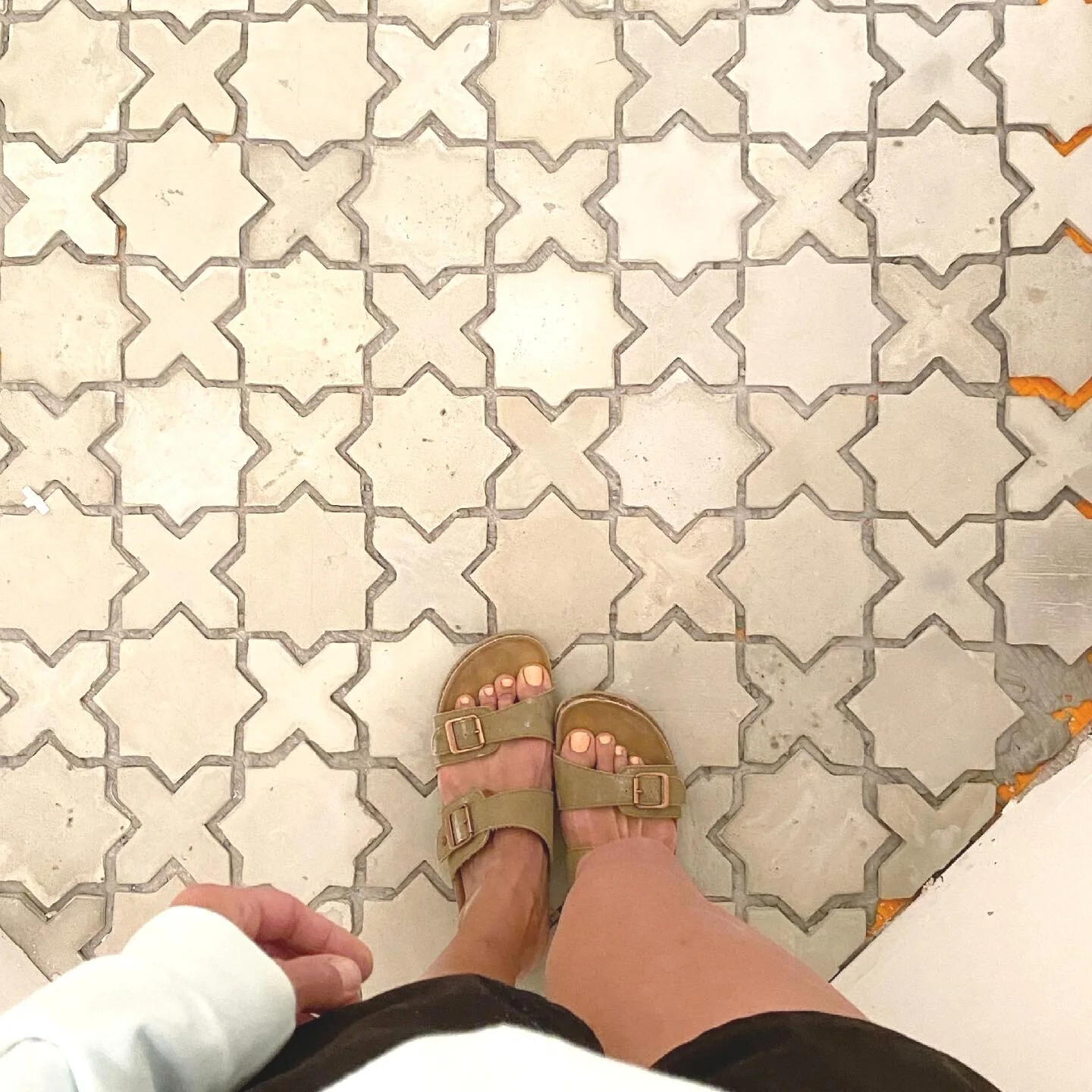 Tile shot feet.jpeg