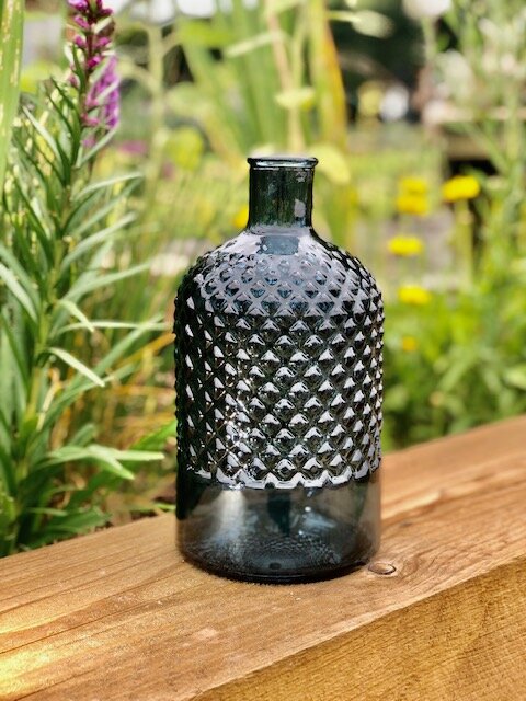 blue bottle on wood.jpg