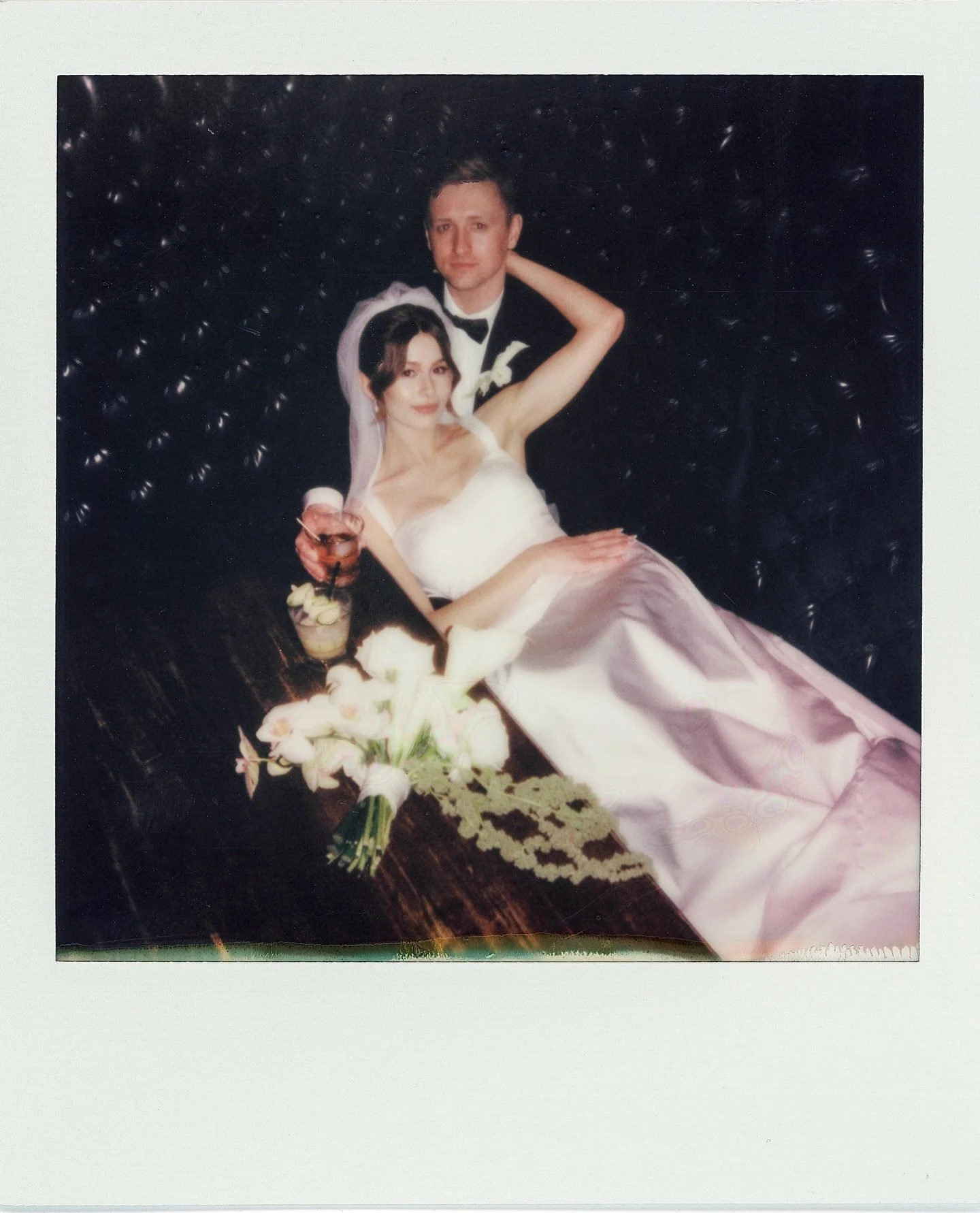 newlyweds on polaroid film 
💘
florals : @hawthornfloralatelier 
makeup : @solomiamua
hair : @layleeatcapelli 
dress + veil : @thebridalboutiqueyxe 
locations : @congressbeerhouse + @deltabessyxe