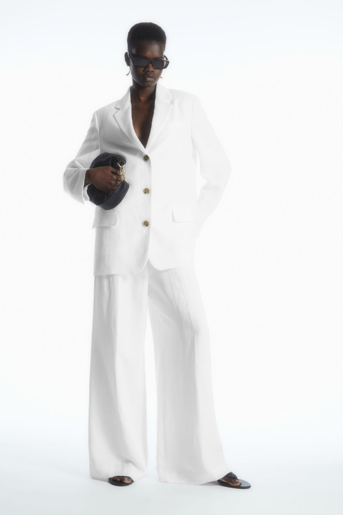 HIGH-WAISTED WIDE-LEG LINEN-BLEND TROUSERS.png