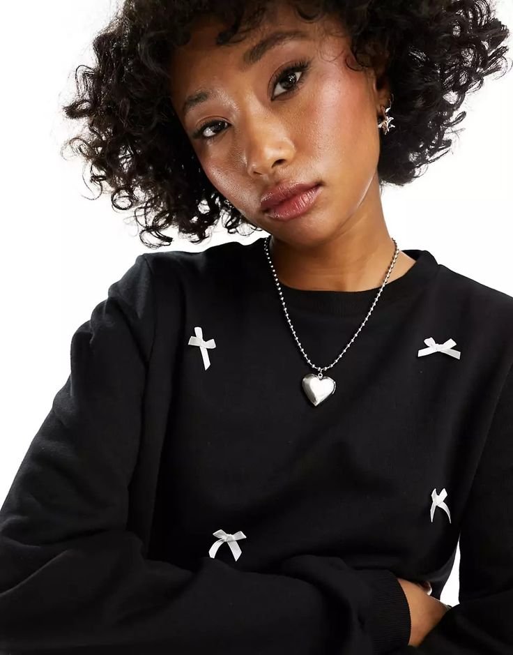 ASOS DESIGN oversized sweatshirt with bows in black _ ASOS.jpeg