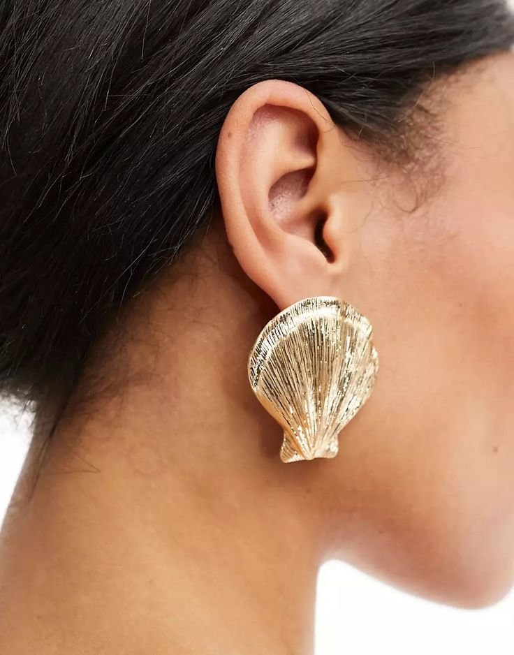 ASOS DESIGN stud earrings with shell design in gold tone _ ASOS.jpeg