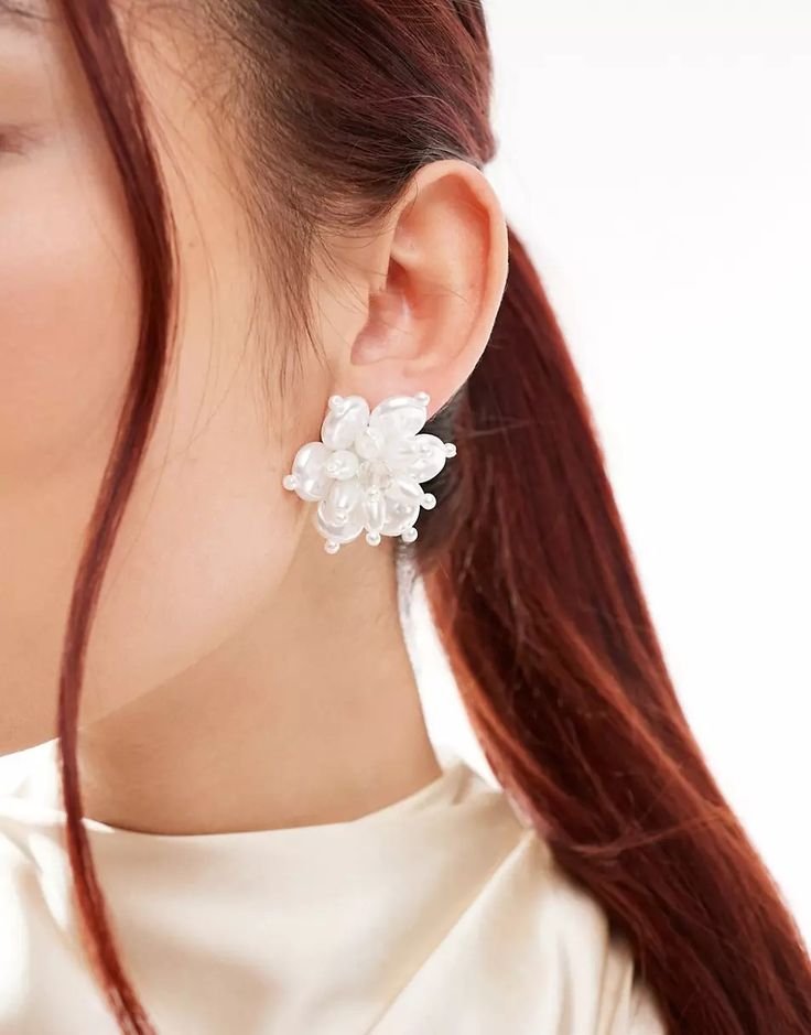 ASOS DESIGN stud earrings with floral faux pearl detail _ ASOS.jpeg