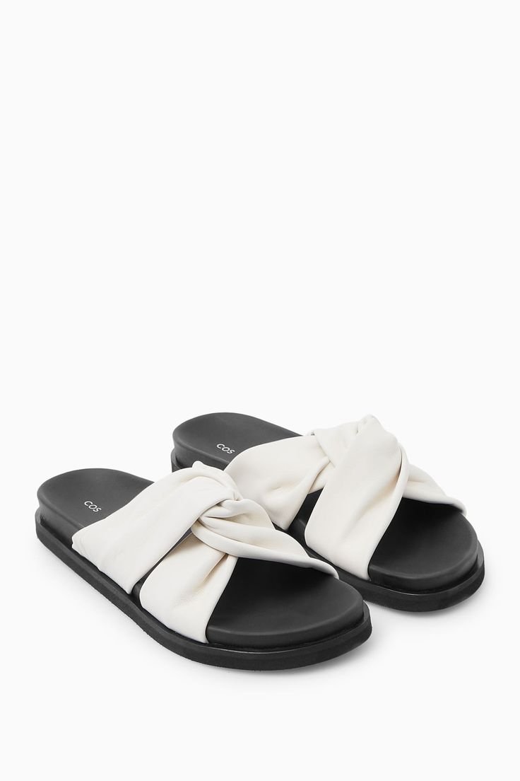 CROSSOVER LEATHER SLIDES.jpeg