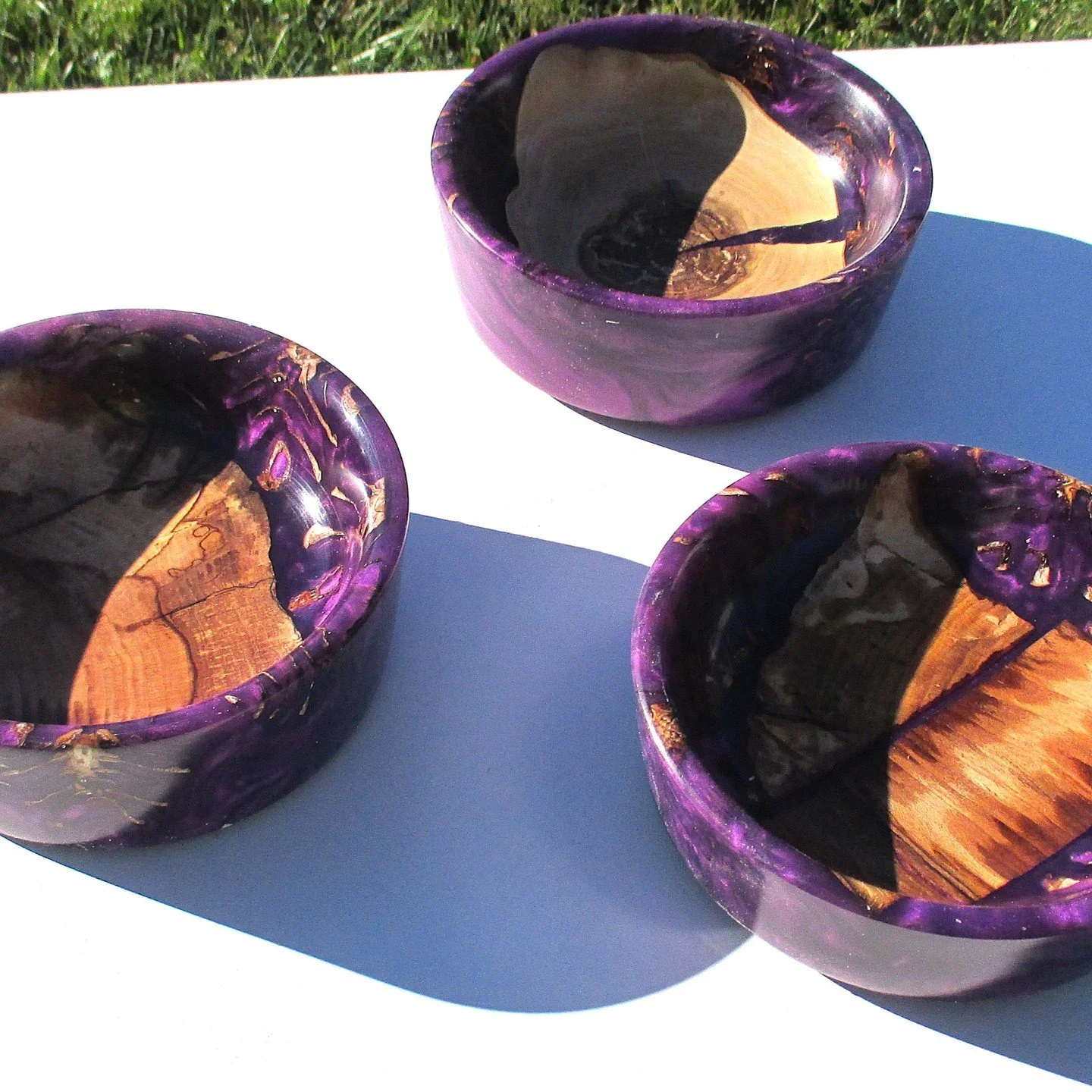 Just finished a trio of purple bowls
