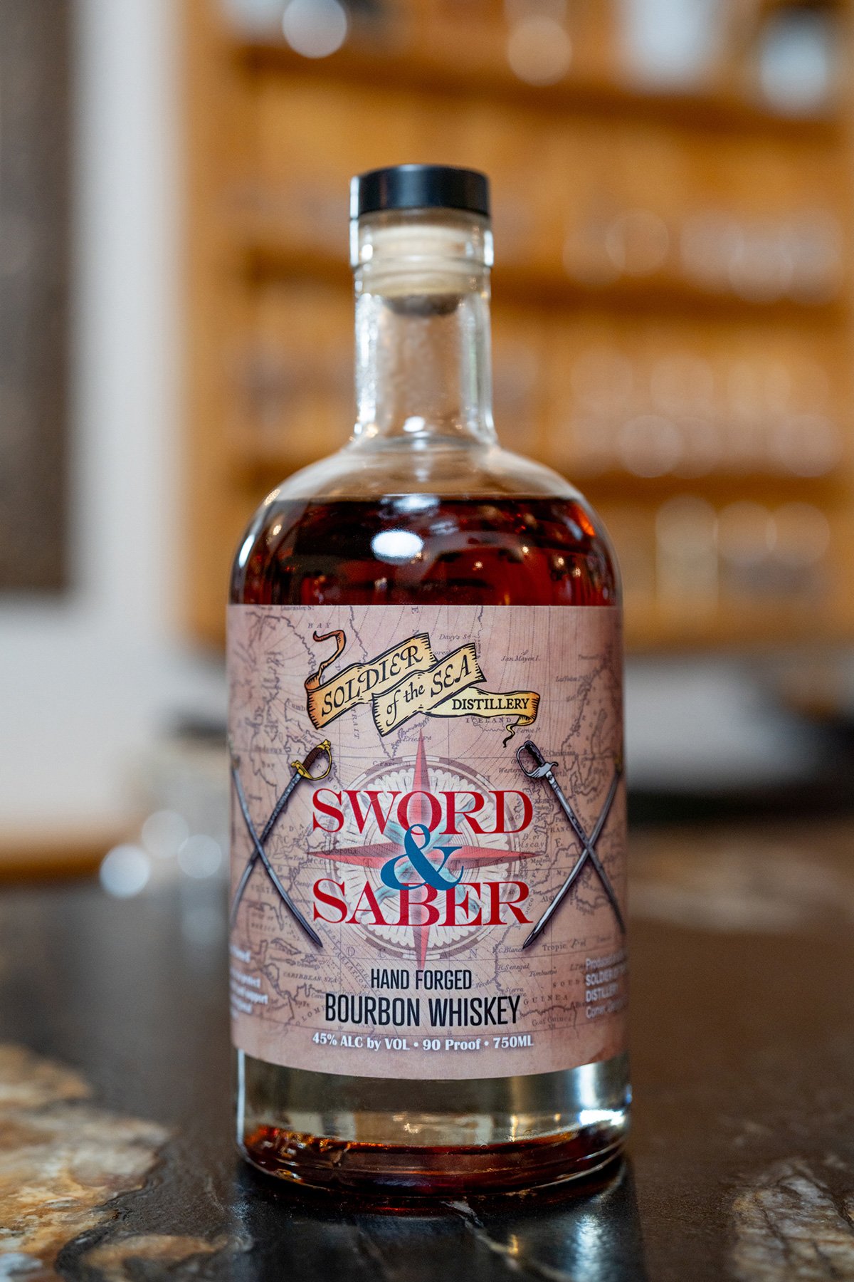 Sword and Saber Whiskey Label Design with Illustration by Frances Thrasher for Soldier of the Sea by Thrasher Photo and Design in Athens, GA