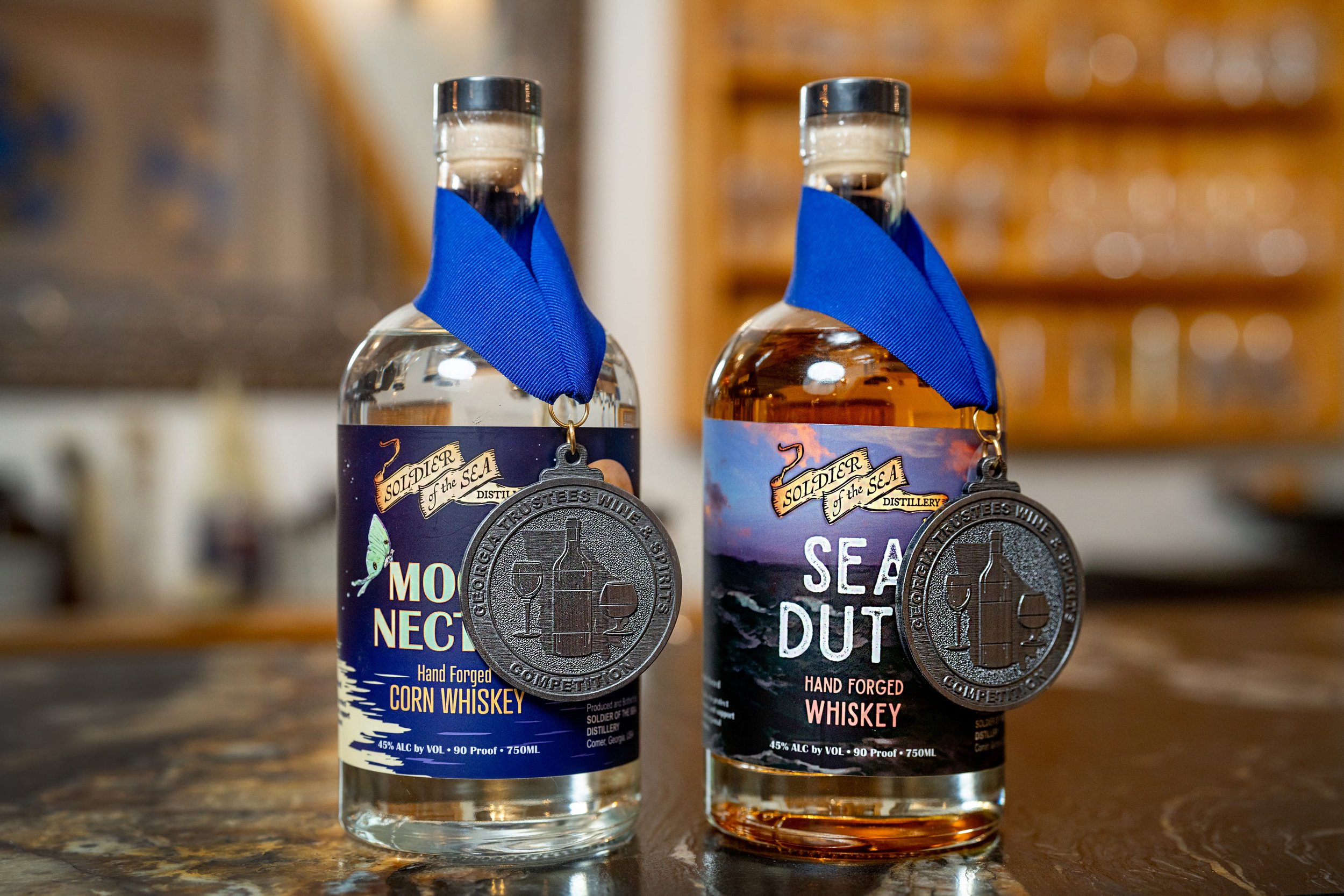Award Winning Whiskey Label Designs by Beth Hall Thrasher and Frances Thrasher of Thrasher Photo and Design in Athens, GA