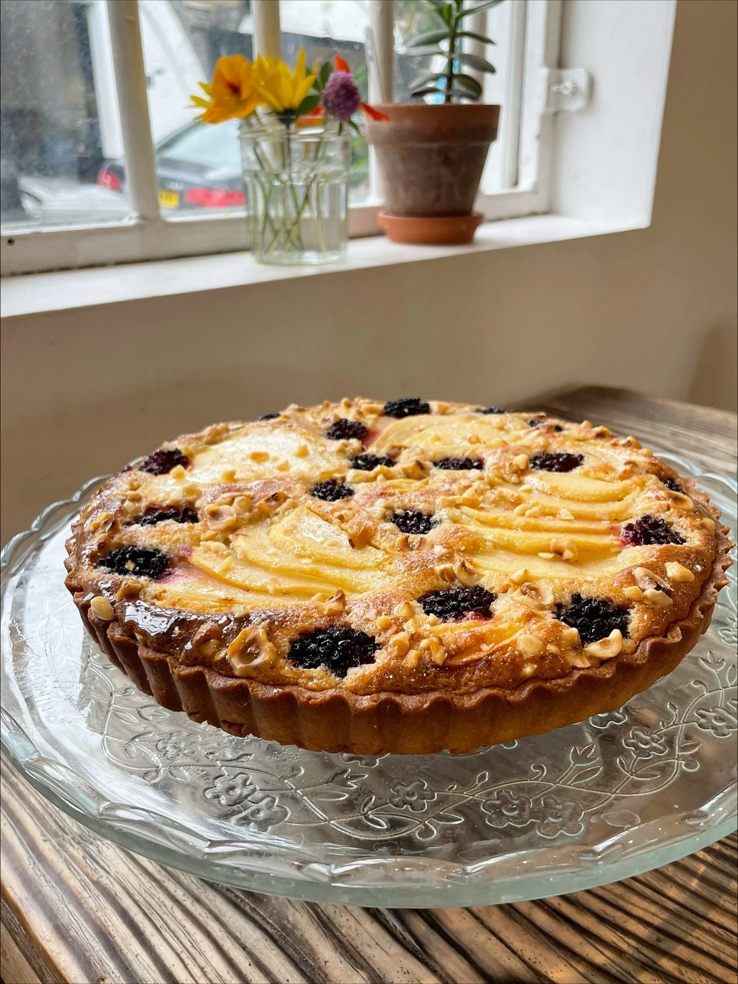 Seasonal bakes by Milly - pear and blackberry tart, blackberry and almond cake, and quince &amp; apple crumble made with surplus quinces kindly donated by friends of the cafe from their gardens 💚

#bakes #seasonal #autumn #blackberries #quince #frui