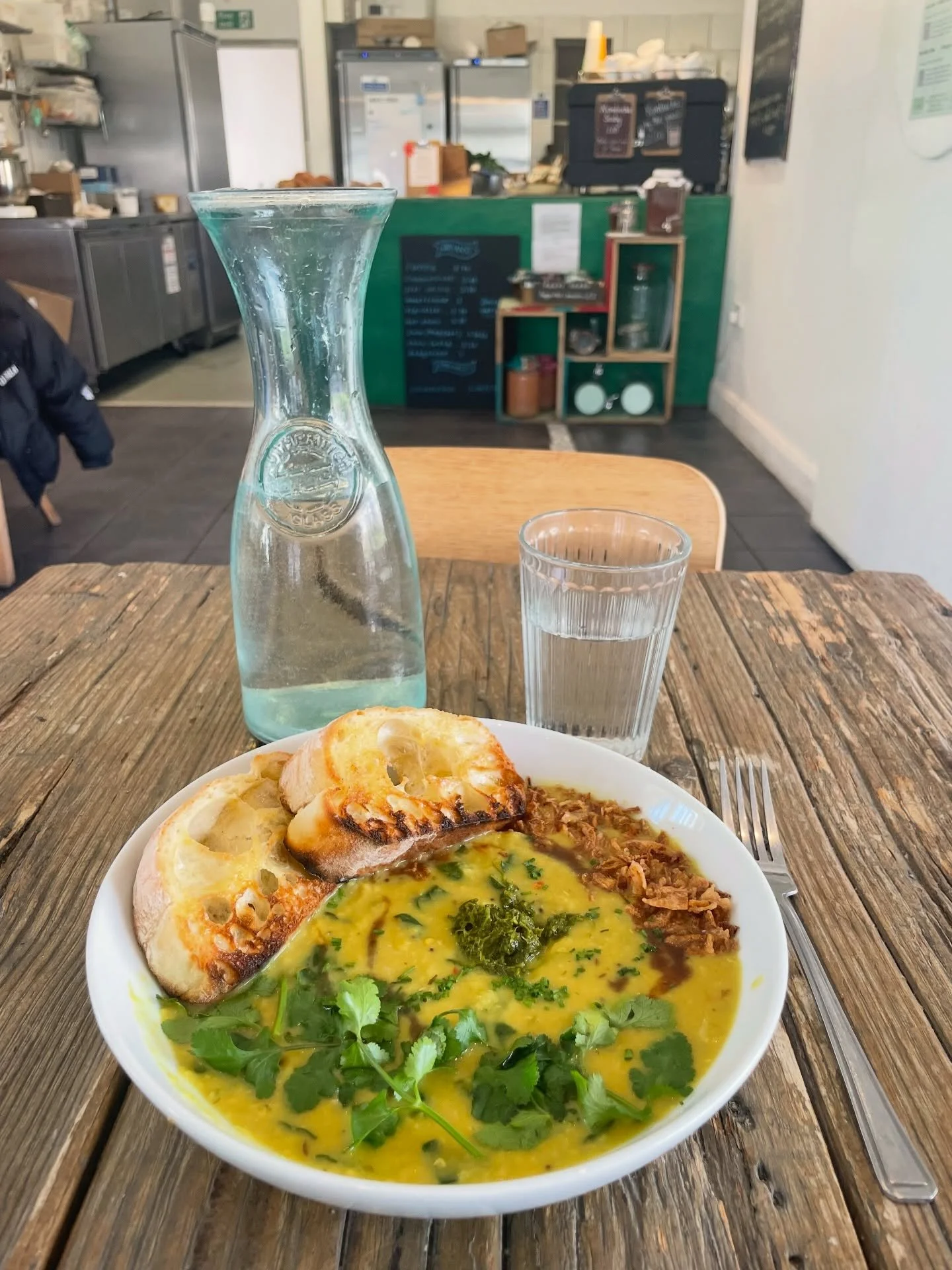 Coconut dhal with spinach, tamarind and coriander chutney, and spiced butter sourdough - and you can add an egg if you like 🍳 

#lunch #food #onthemenu #brixton #camberwell