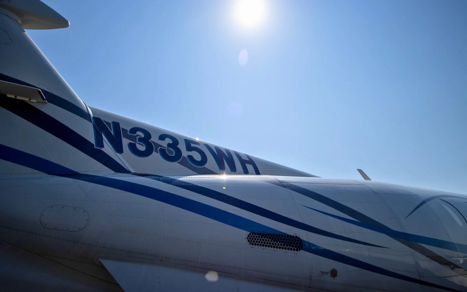 Wing of Coeur d'Alene Aviation's Pilatus PC-12, tail number N335WH