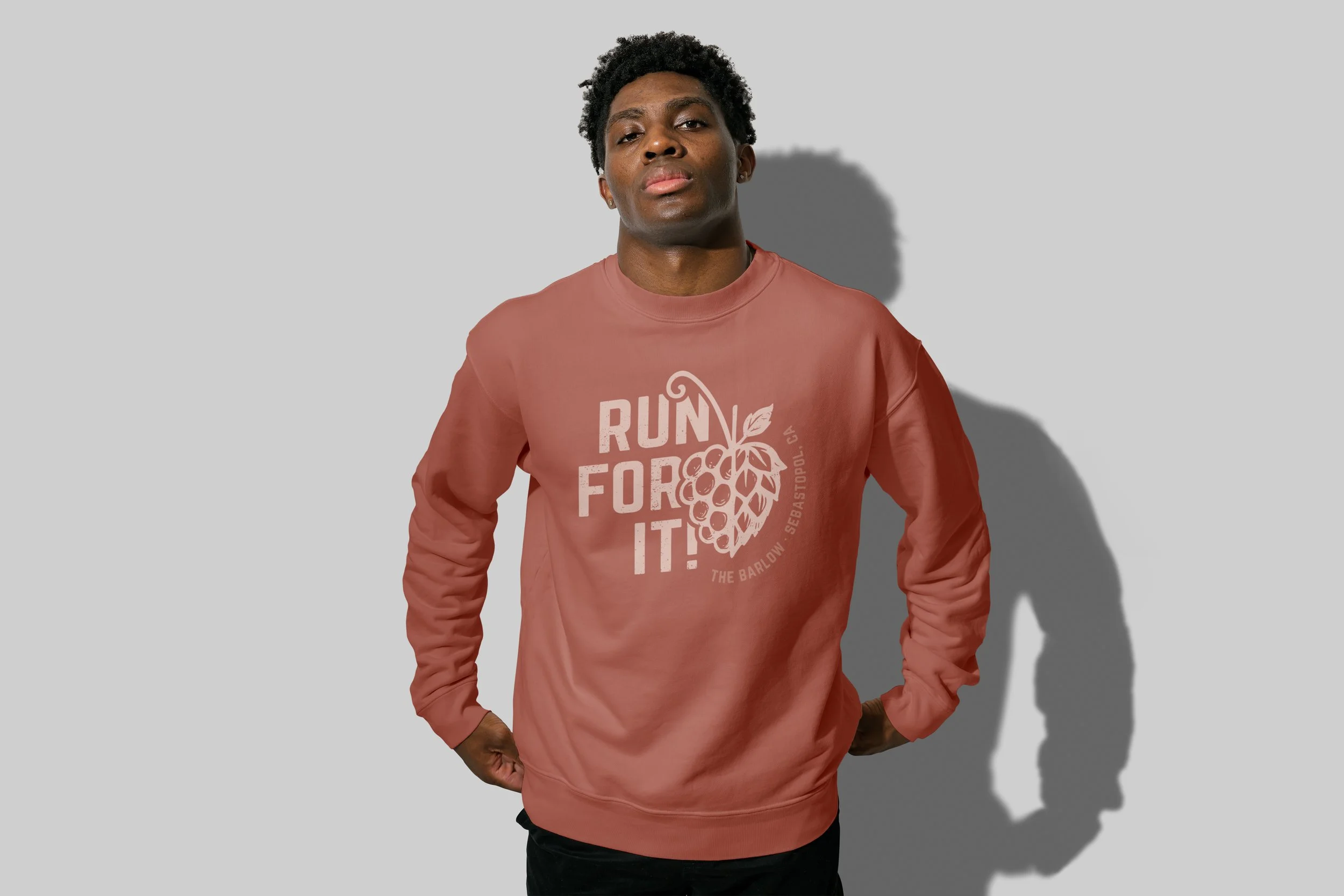 man with branded sweatshirt design