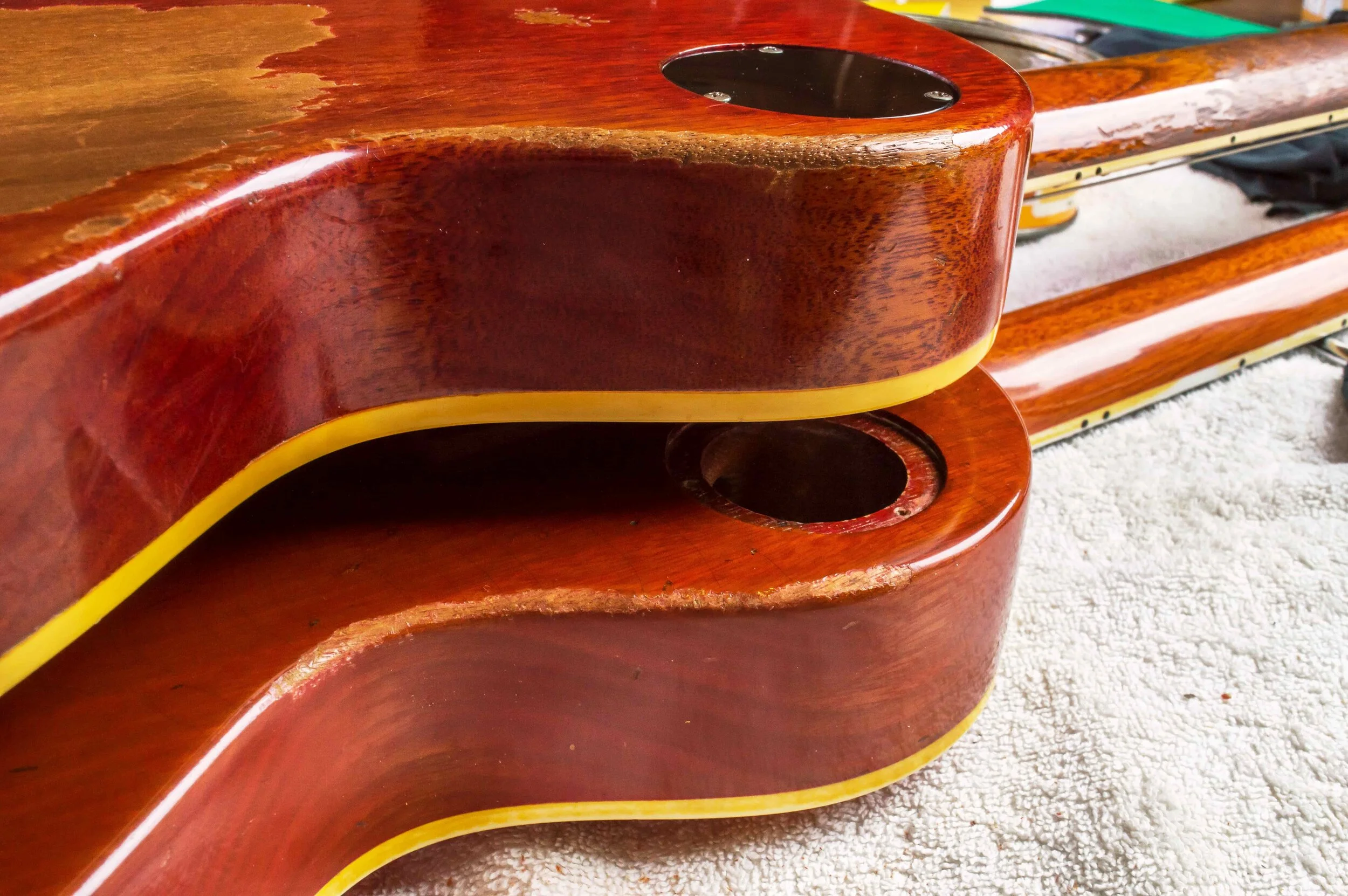 Having a genuine Burst to use for reference is a massive help, but the chipped areas need wax and stain.