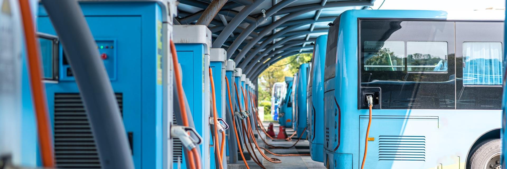 AdobeStock_305433246 - Blue EV Buses Charging Small.jpeg