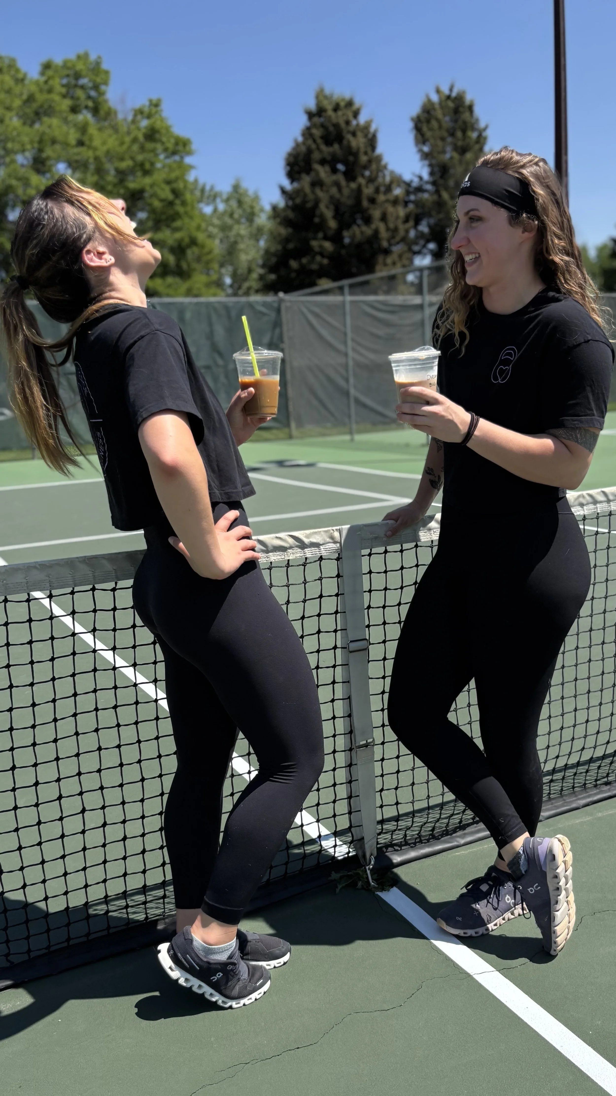 female personal trainers and dietitian having a conversation together