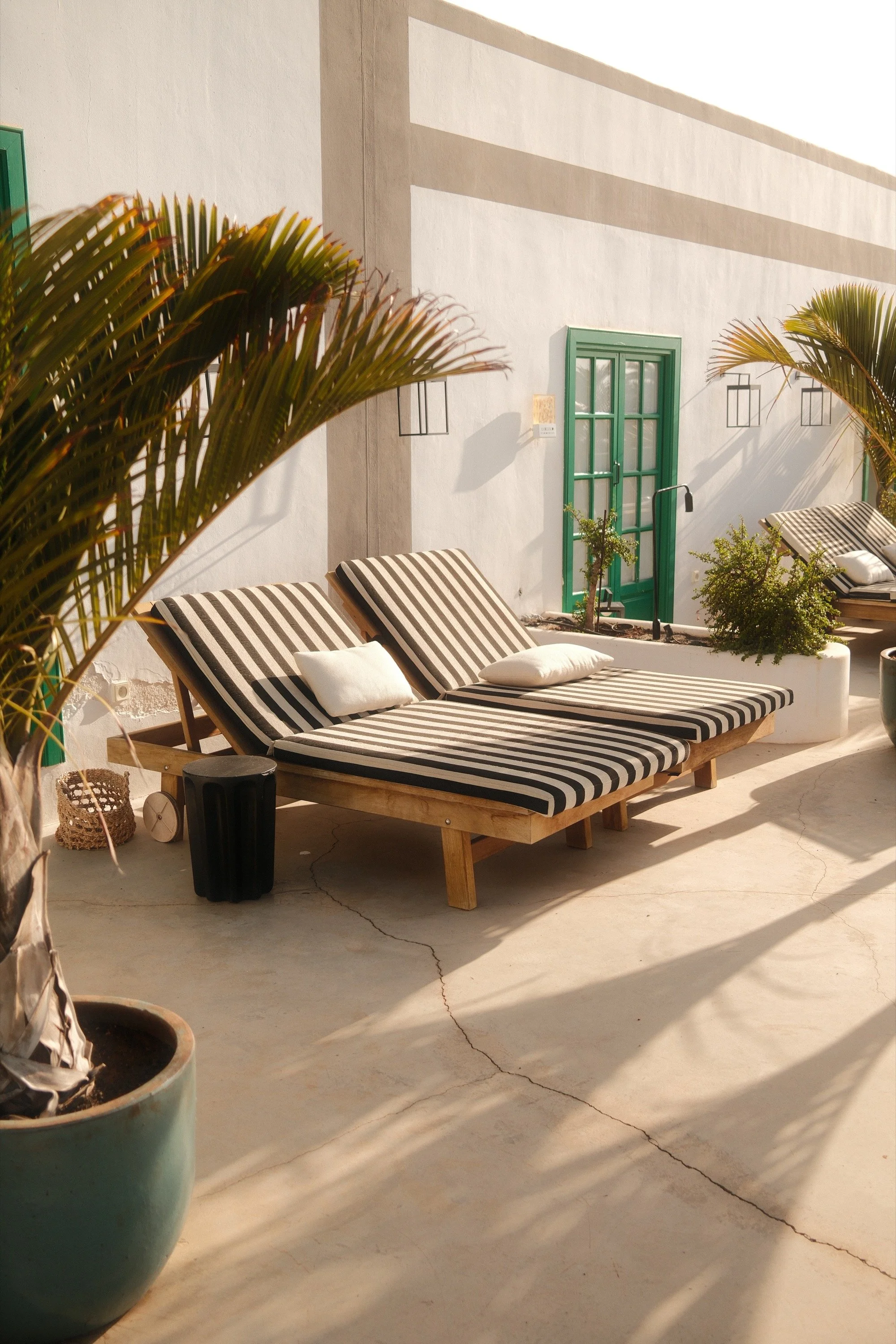 Terrace architecture and striped loungers