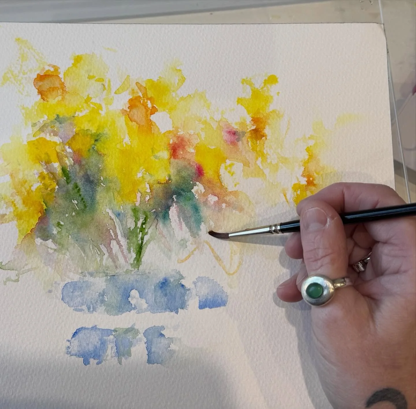 I'm currently working on this painting of daffodils. I really like this stage in a watercolour painting - all the expressive spontaneous brushwork in the first layer. I don't want to ruin this by ploughing on too soon (although when I'm the flow of p