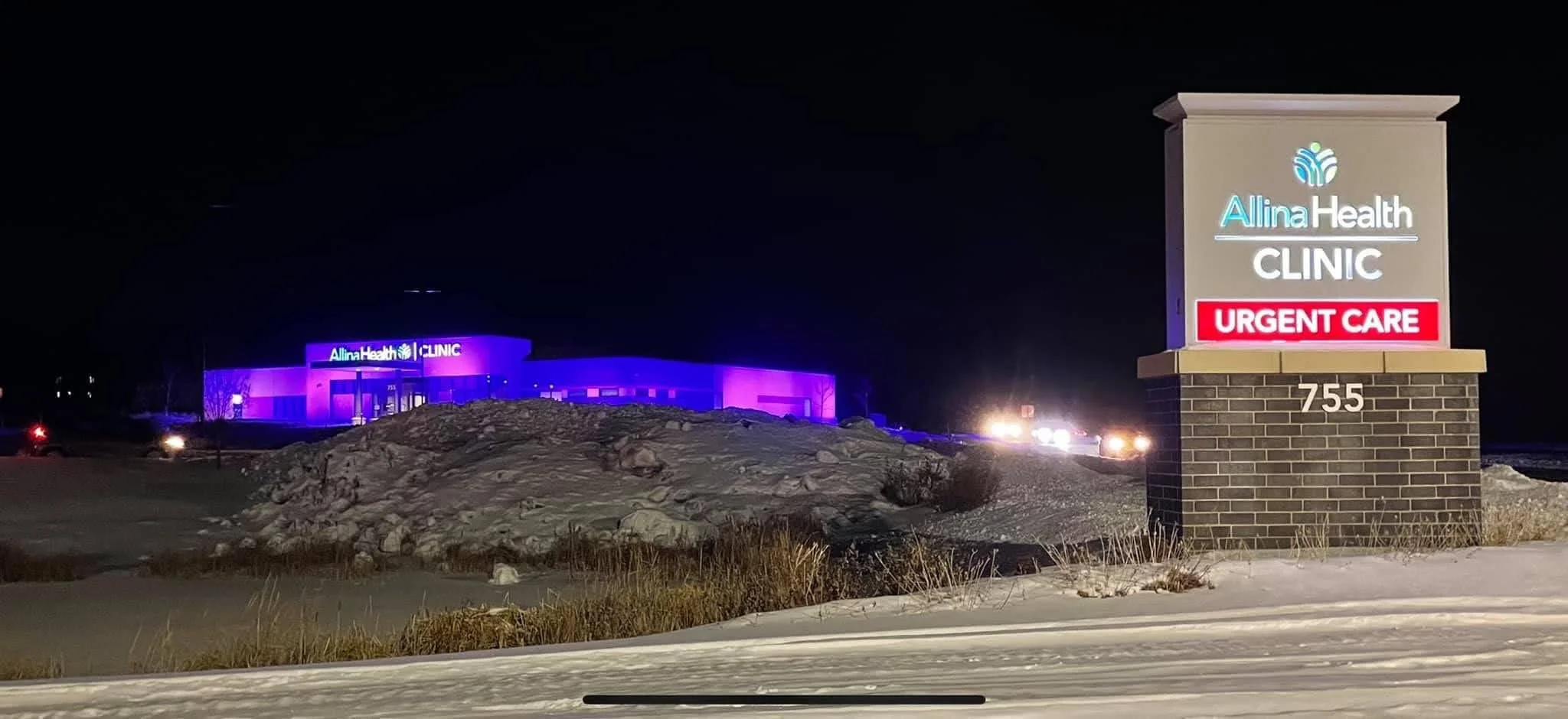 Allina Crossroads lit up in purple honoring the victims and employees #BuffaloStrong