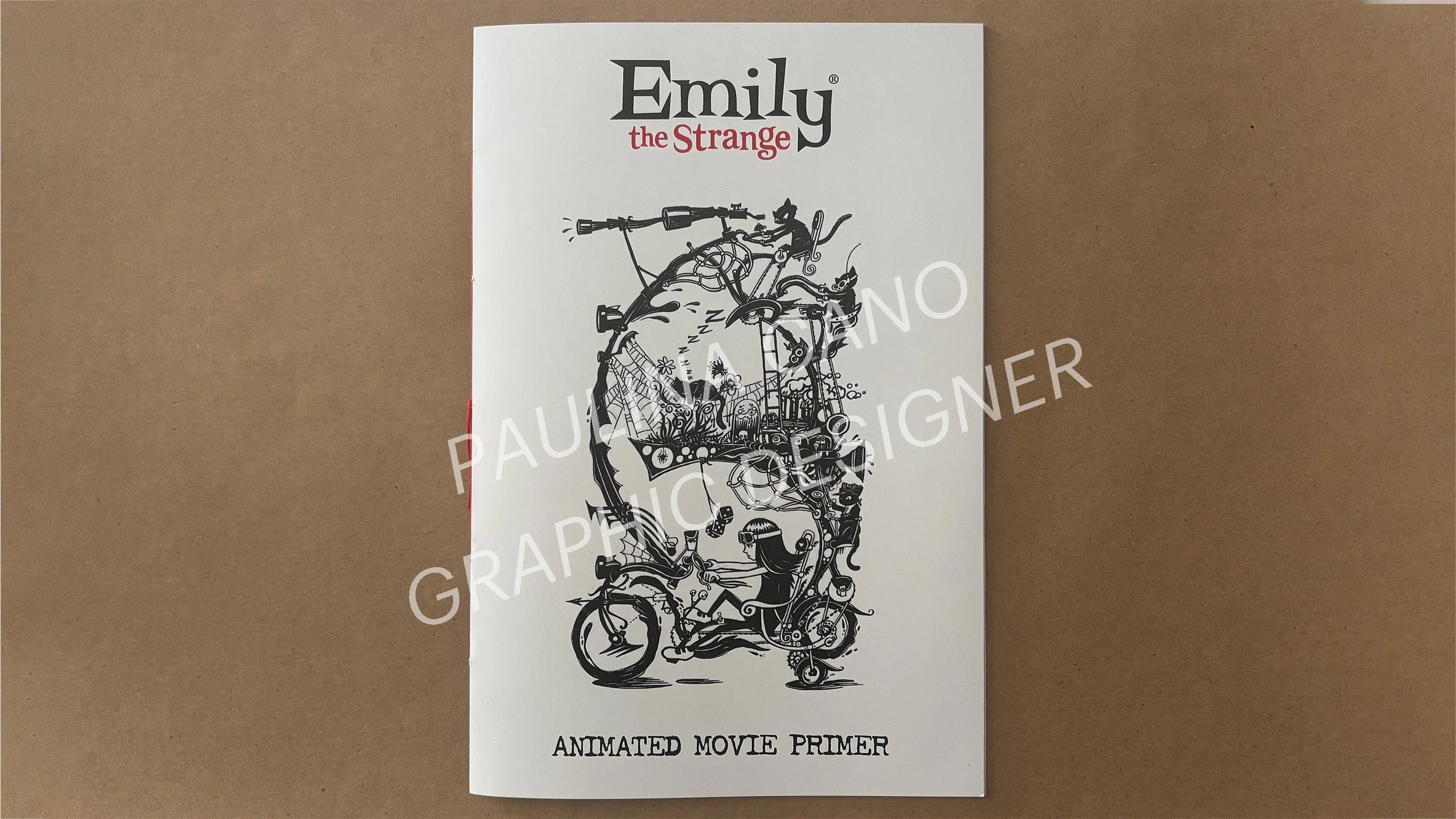 A white booklet titled "Emily the Strange" with the subtitle"Animated Movie Primer." 
