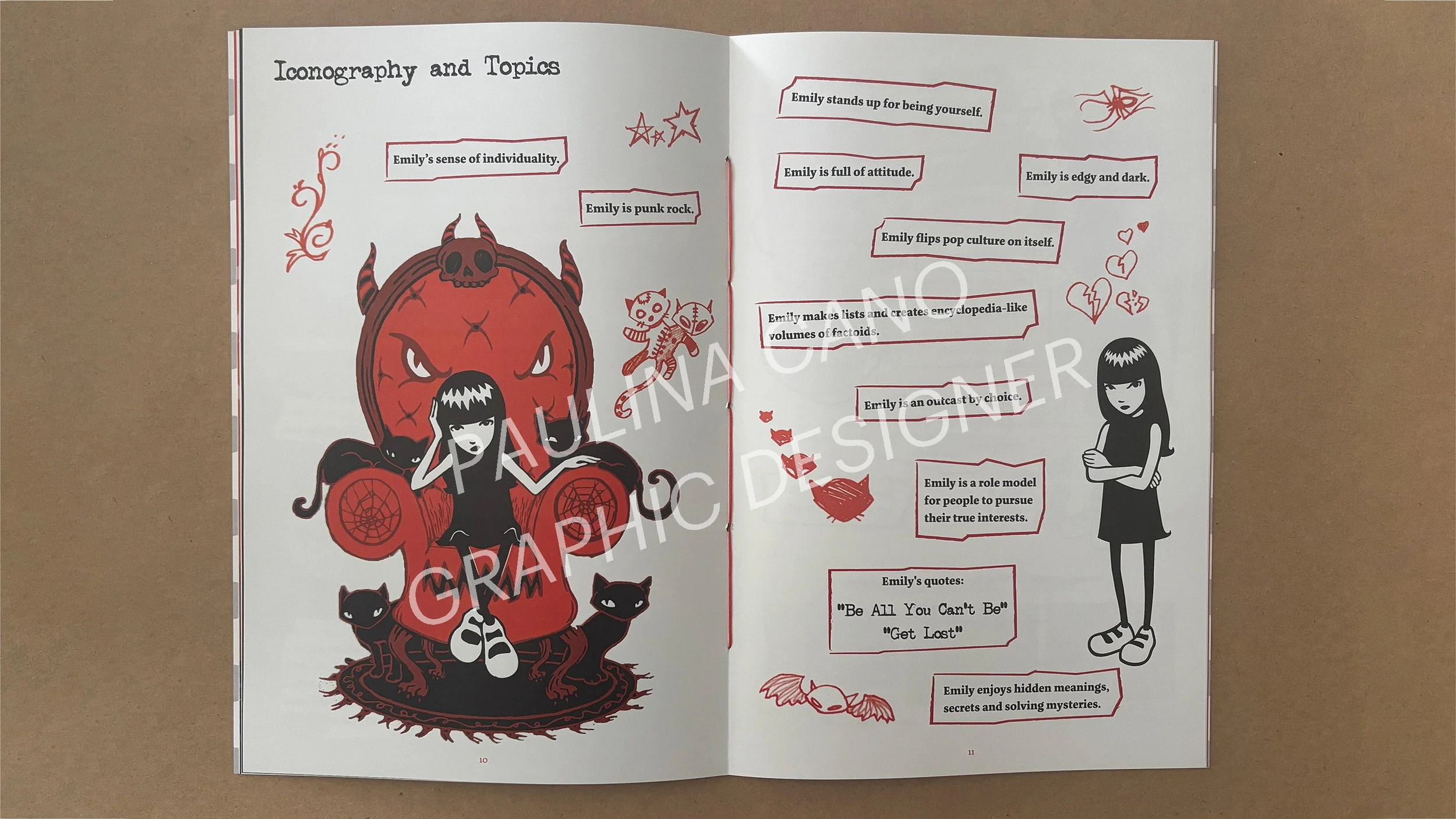 Open magazine spread with illustrations and text about a character named Emily. The left page features a cartoon girl with black hair, surrounded by black cats, a large red demon-like figure with a skull on top, and decorative elements. The right pag