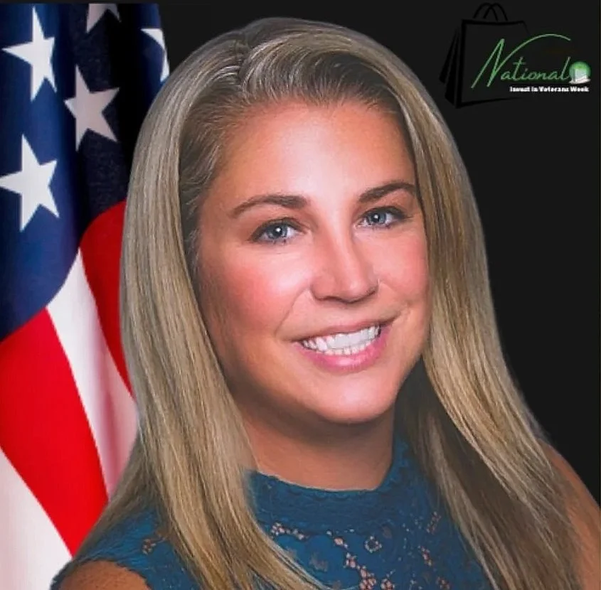 A woman with blonde hair smiling in front of an American flag and a black background with a logo that says 'National Invest in Veteran Owned Business Week.'