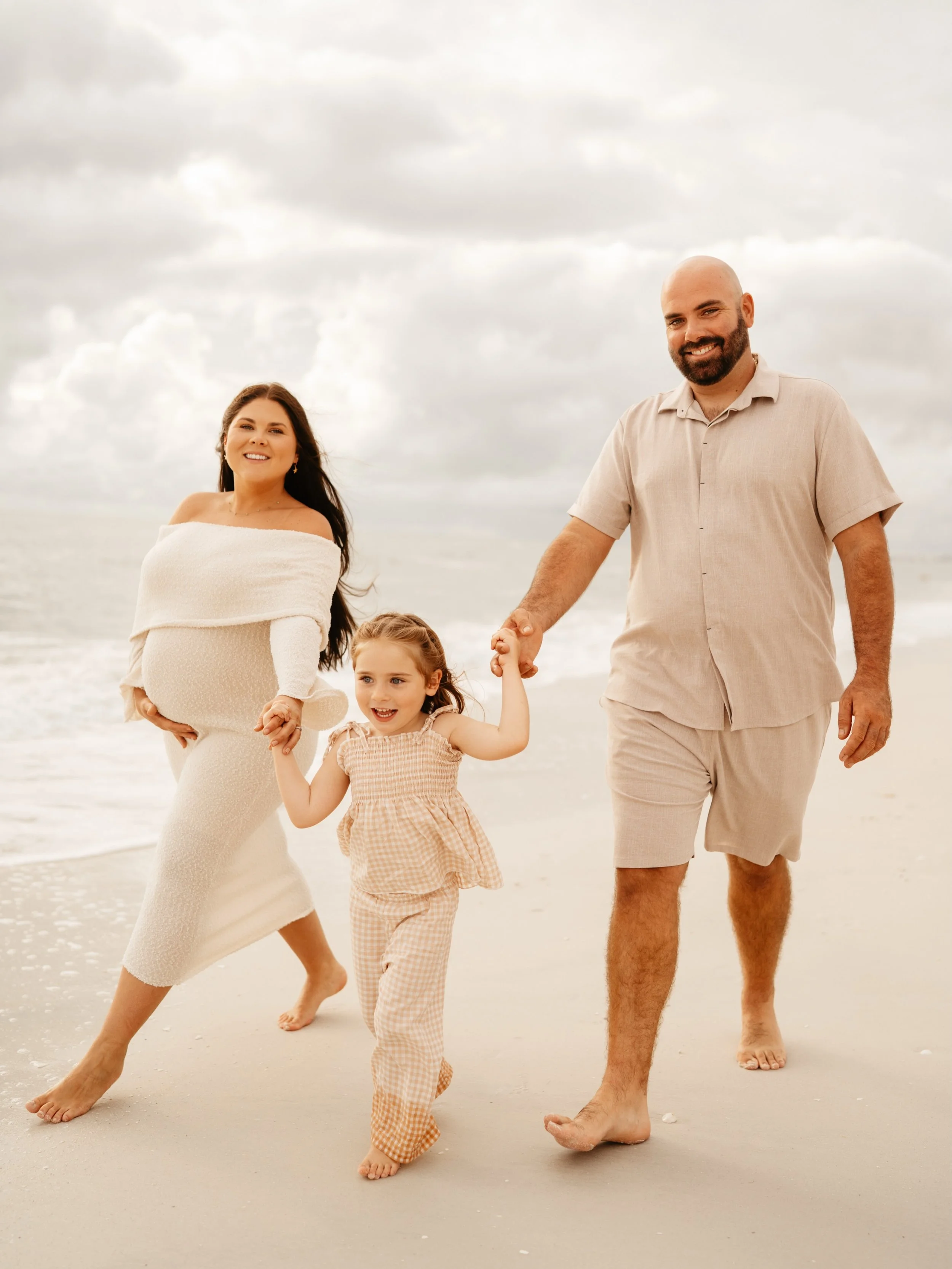 overcast skies are unheard of here in Florida. KIDDING 😆

Maternity round 2 for my beautiful Korinne 🤍 she glows every single time 🥹 &amp; Emma simply is just her fun joyful self 🧑🏻&zwj;🩰💕✨

#maternityphotographer #beachmaternity #familybeachp