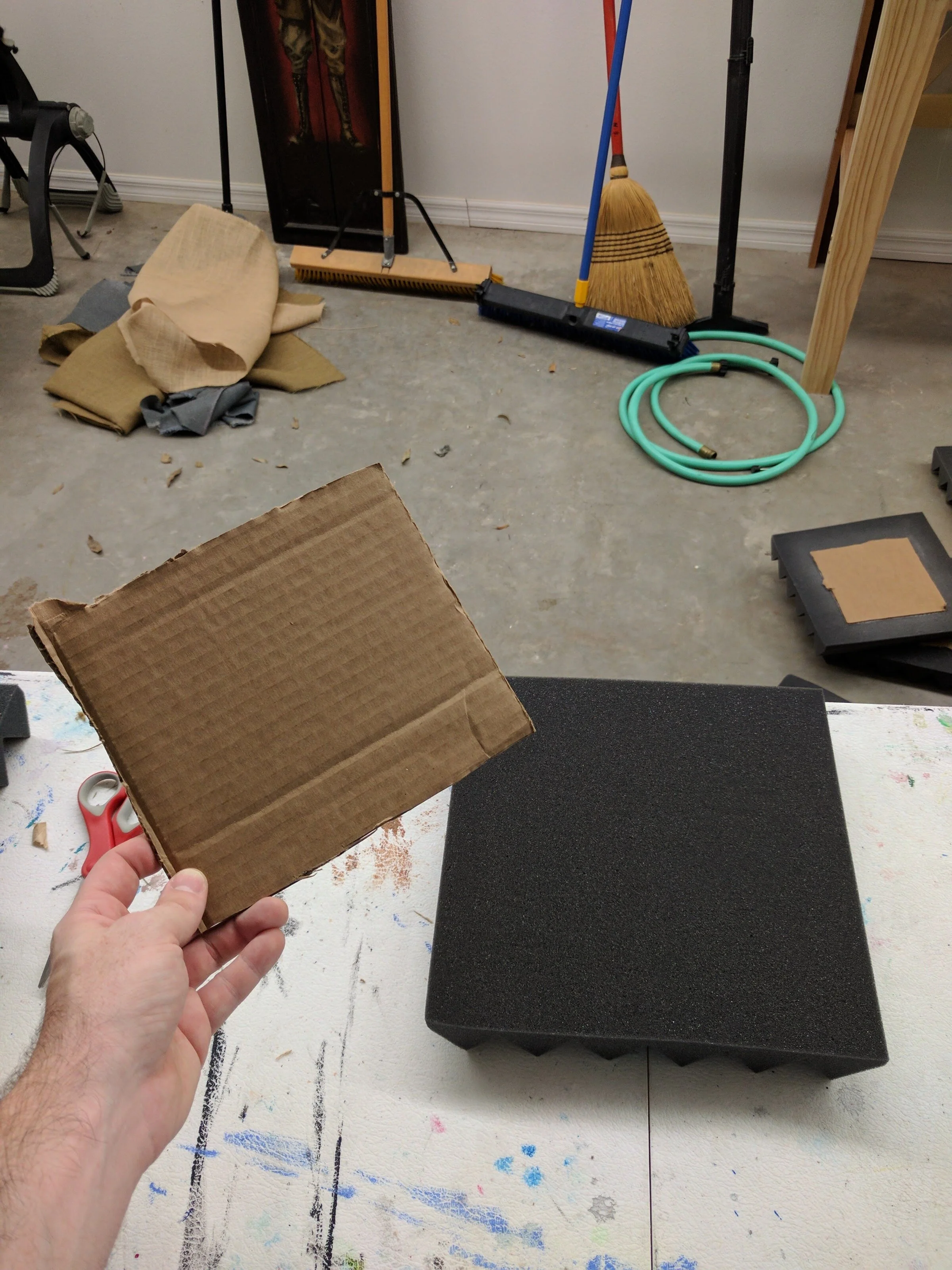 In addition to the custom panels I built, I have a lot of this acoustic foam as part of my vocal booth. This stuff is great, but spray adhesive this directly to the wall and you will never be able to remove it without damaging the foam or the wall si