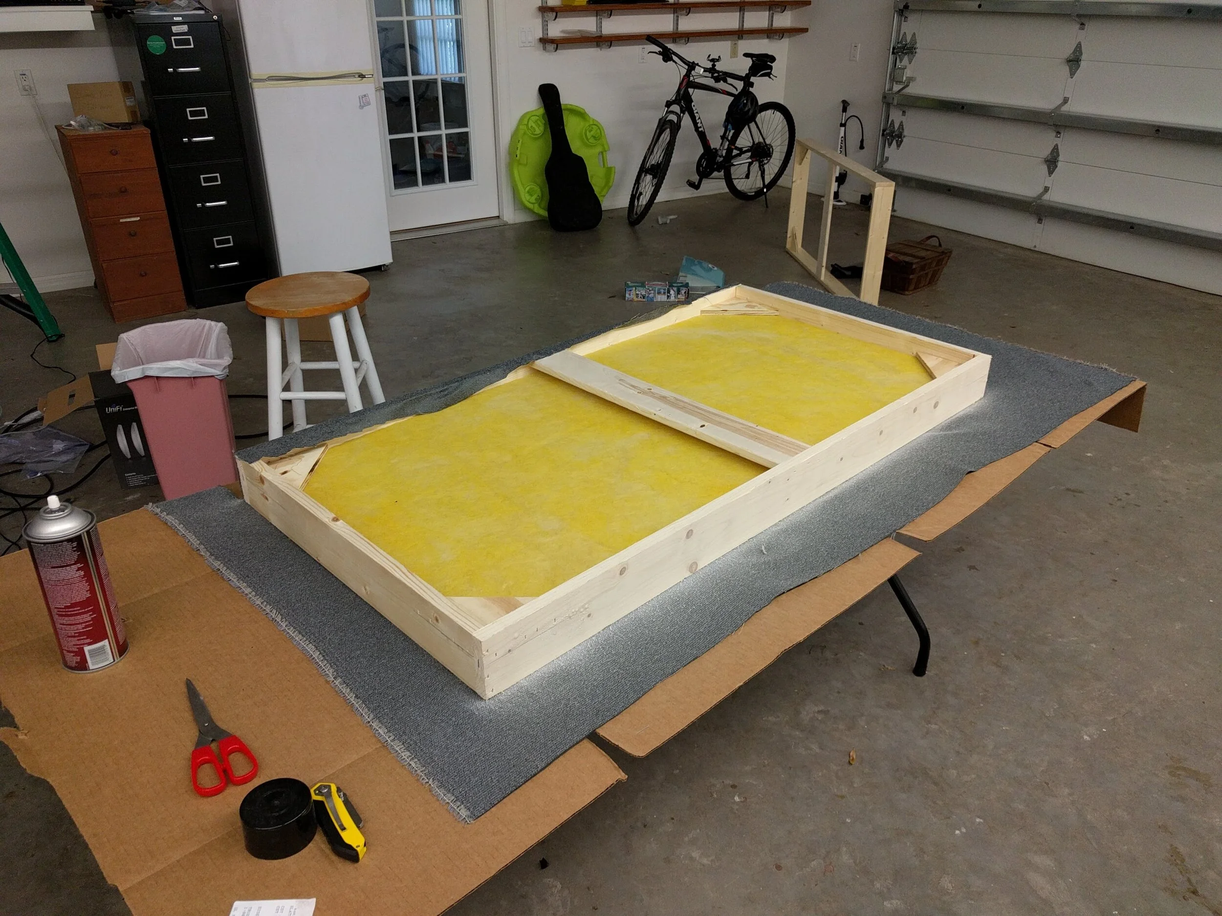 Next step was to start cutting and fitting the fabric to the frame. This required lots of patience and spray adhesive.