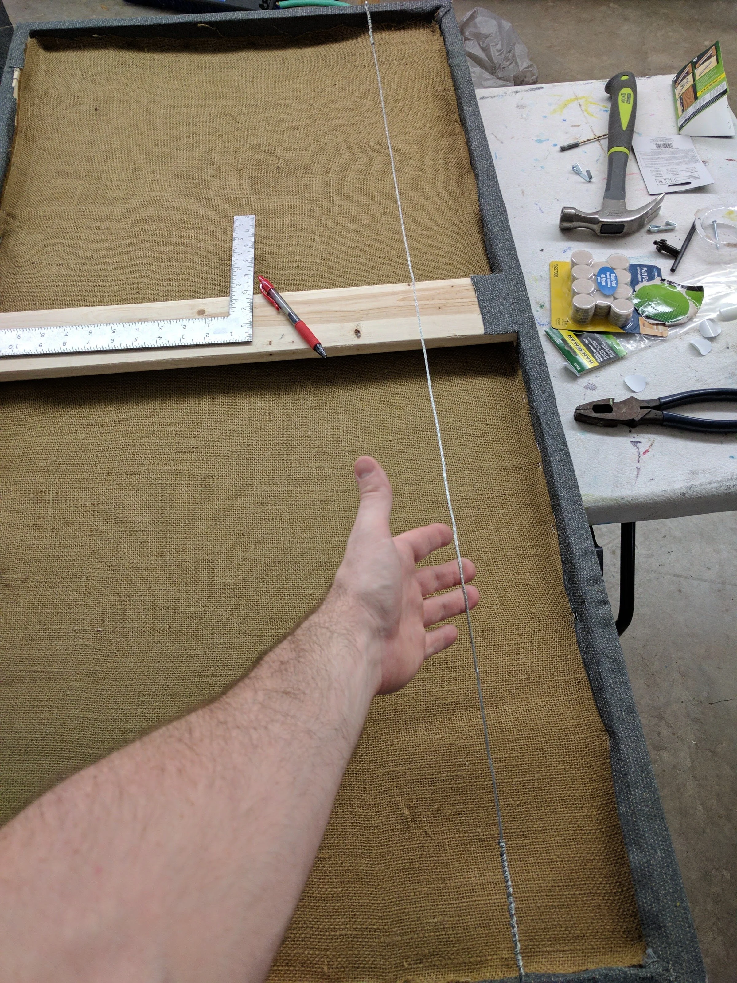 I didn't get too many shots of the back, but here you can see the finished back of the panel is burlap material. This keeps the fiberglass in and the cost down.