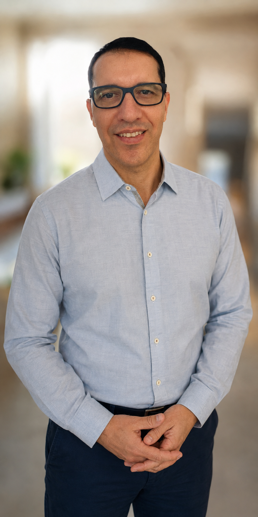 Mauricio Ocampo, CPA, founder of Flightpath Accounting, smiling in a light blue shirt.