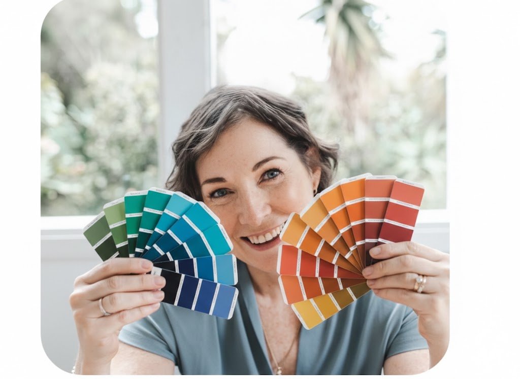 Picture of woman holding colour swatches