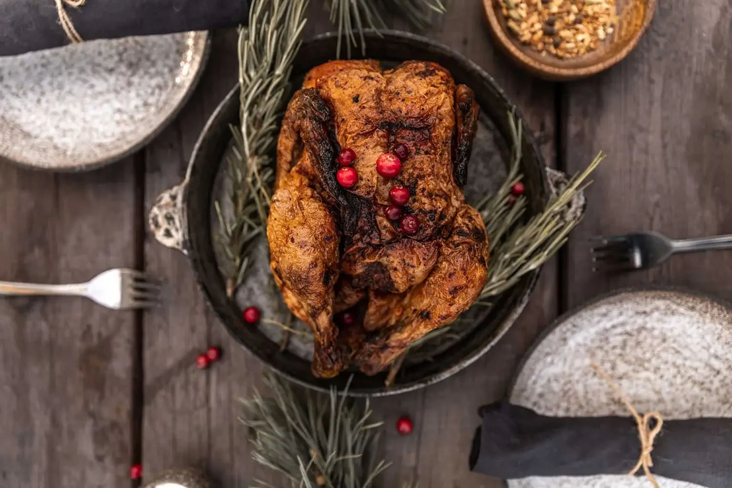 Thanksgiving roasted turkey ready for serving on a wooden table