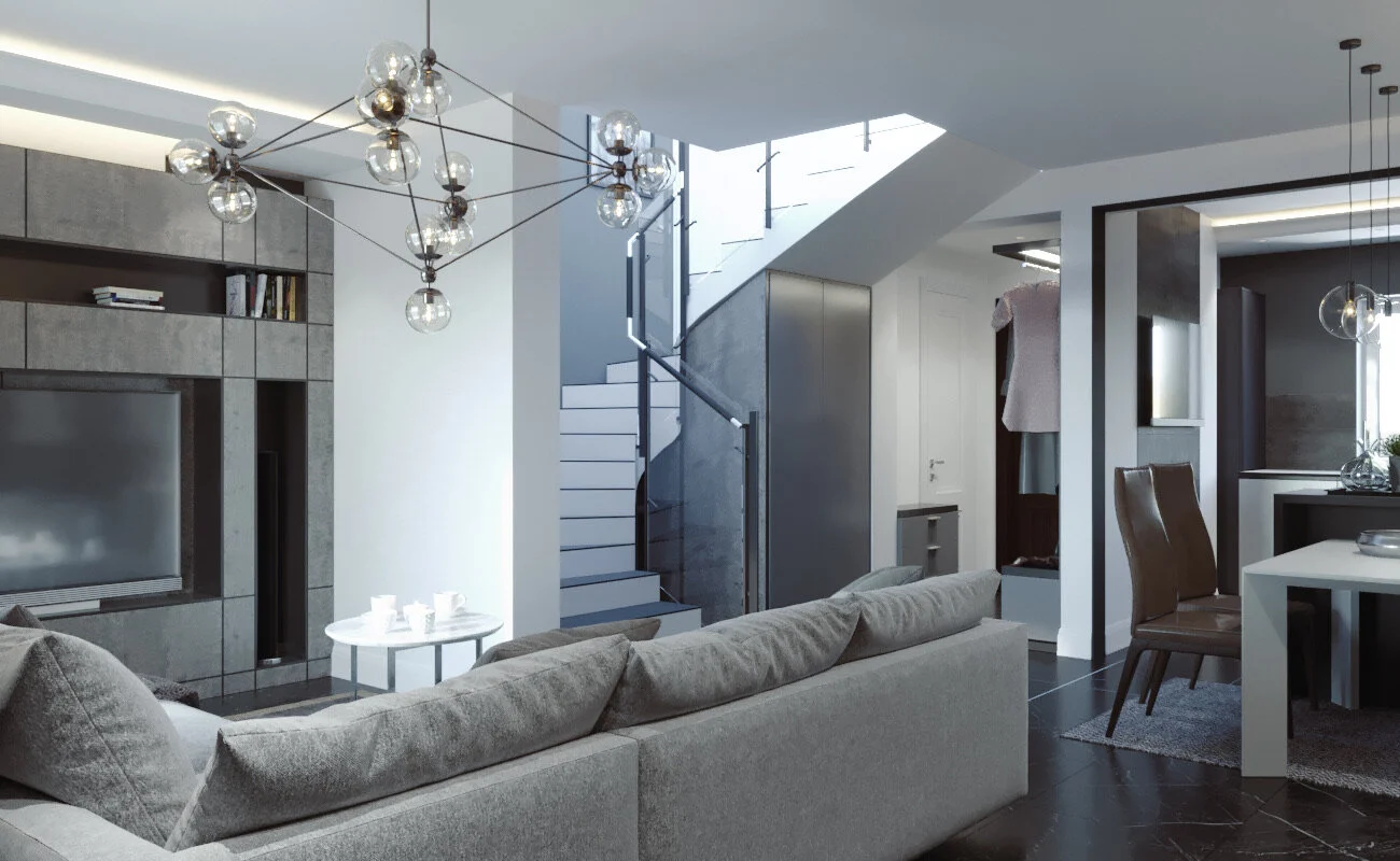 Modern living room with gray sofa, glass chandelier, TV, dining area, and staircase in background.