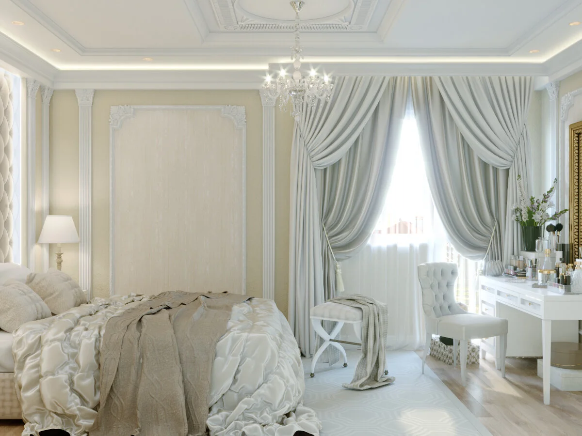 Luxurious bedroom with beige and white tones, elegant bed with cream bedding, large window with flowing white curtains, a white chair, a vanity table with perfume bottles, a chandelier, and decorative flowers.