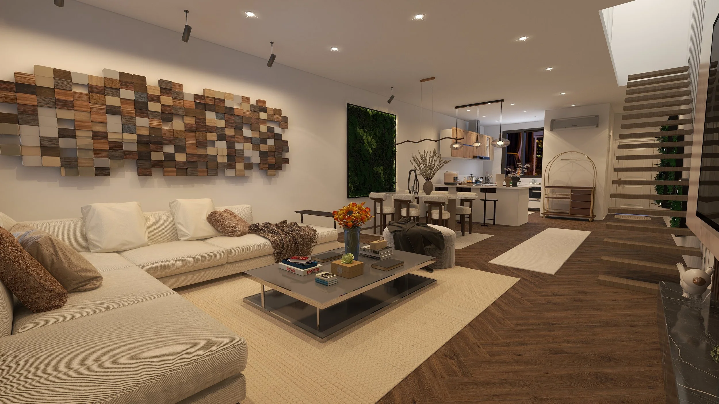 Modern living room with a white sofa, wooden coffee table with books and flowers, abstract wall art, staircase, open kitchen, and dining area.