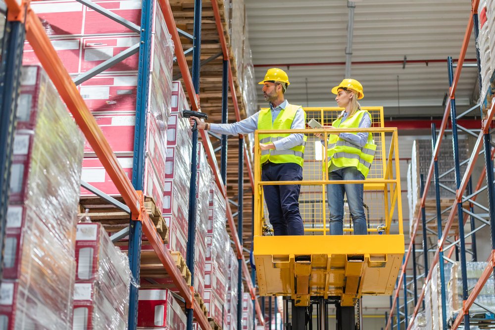 workers-in-warehouse-scanning-packages-2021-08-29-22-34-02-utc.jpg