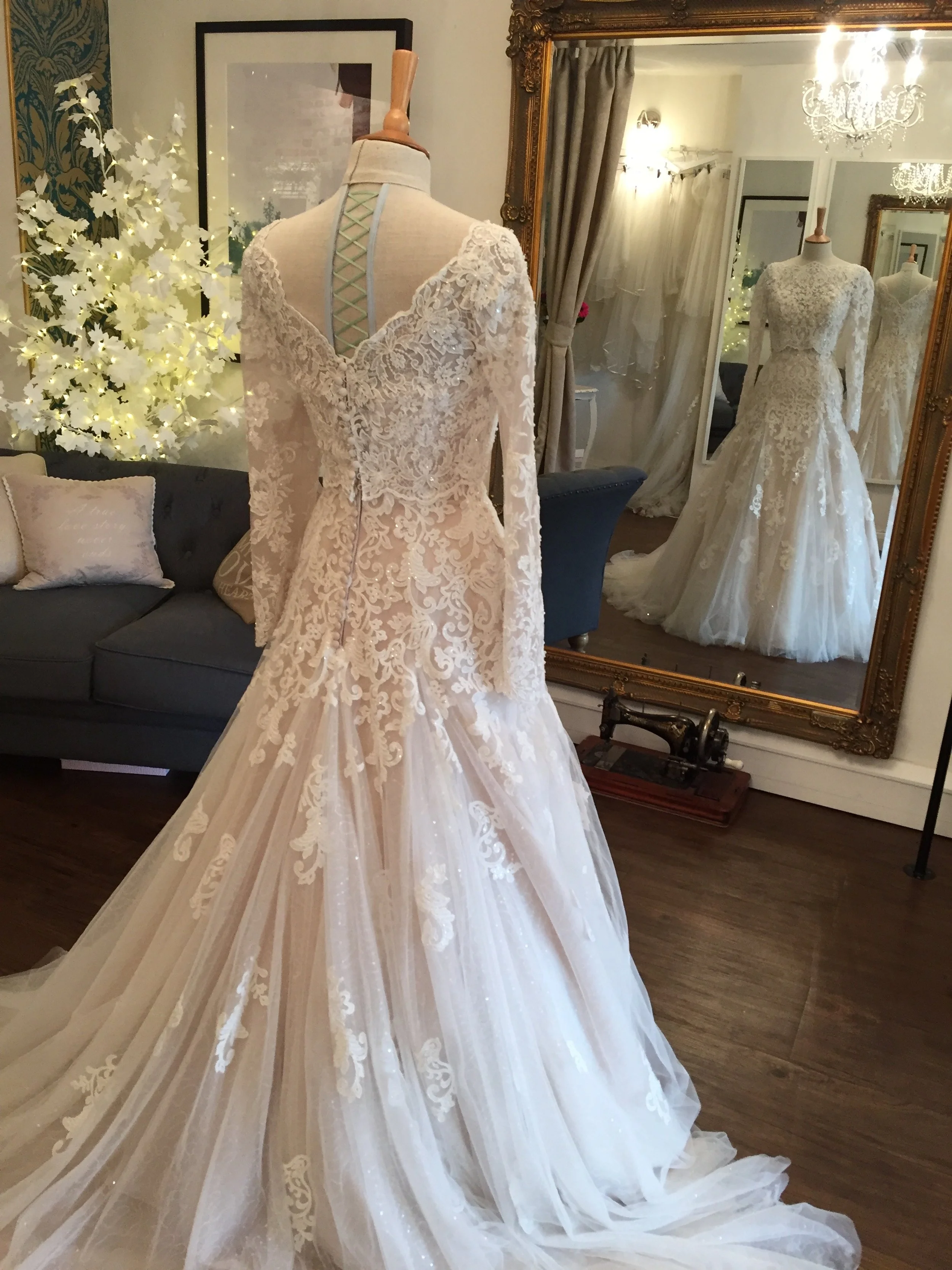 Lace fit and flare wedding dress with detachable jacket