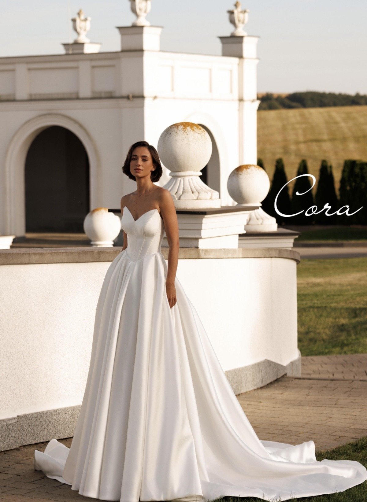 Satin strapless wedding dress with ballgown skirt