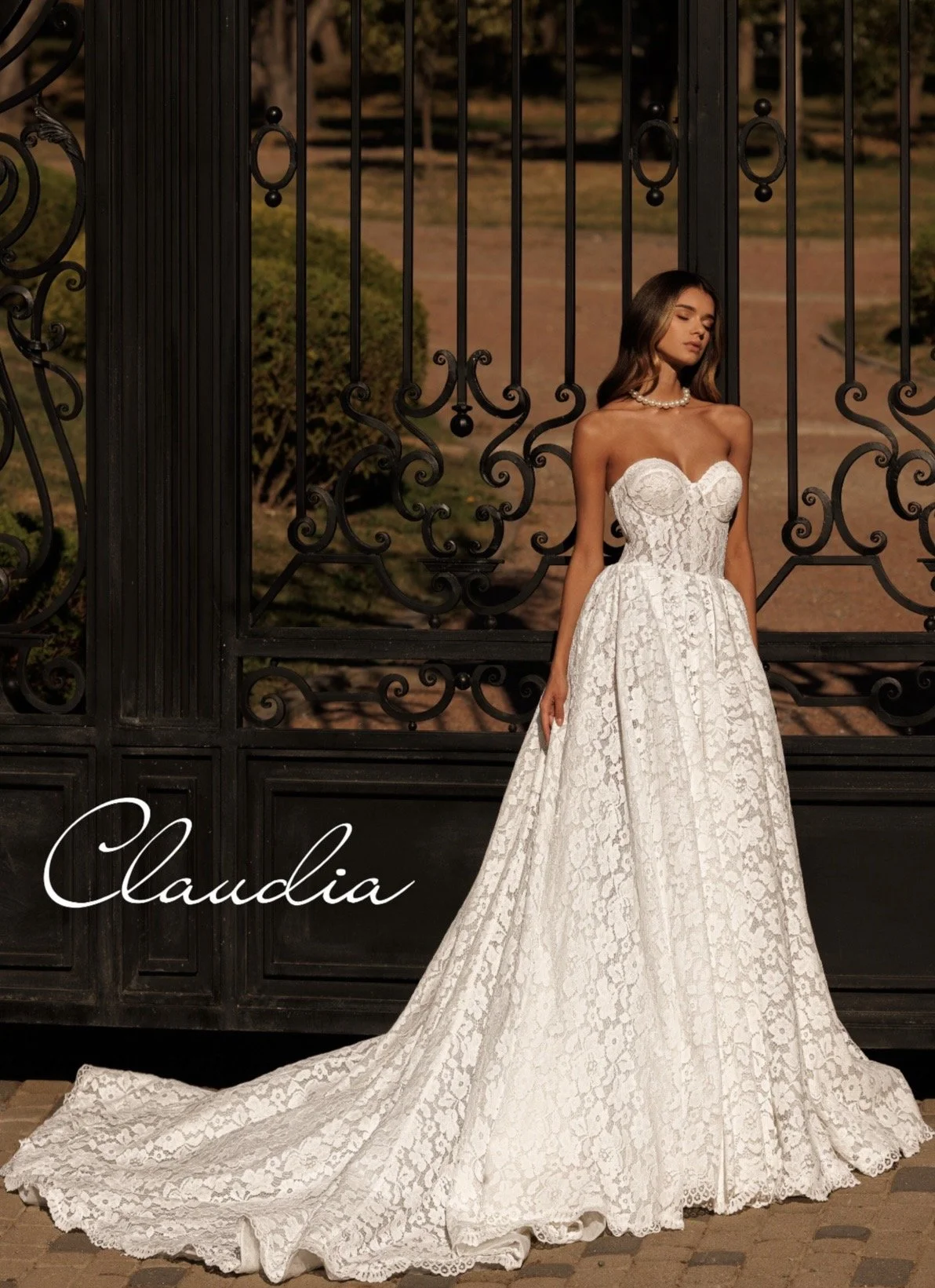 Soft cotton, basque style strapless bodice, full ballgown wedding dress.  Lace is modern floral