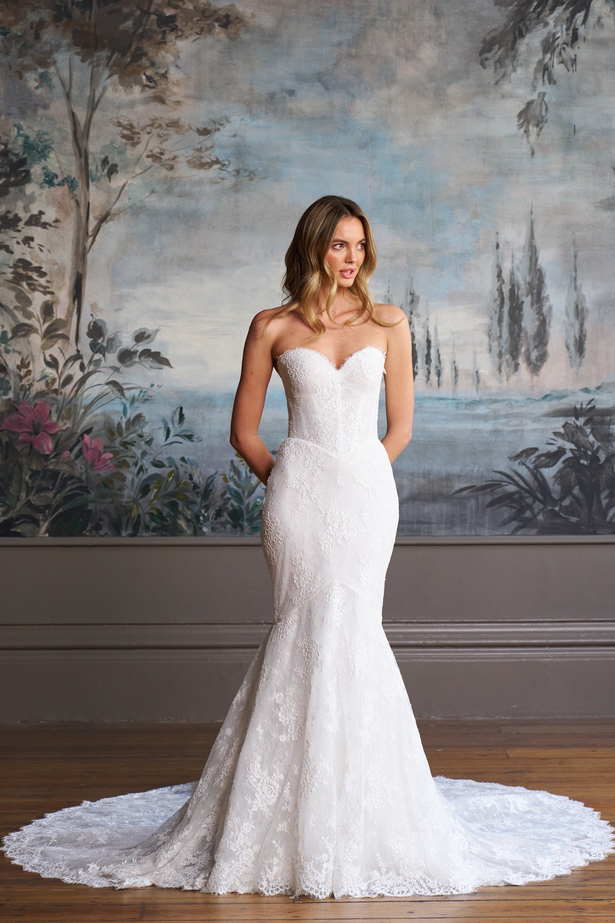 Lace corseted fishtail gown available at Boo Bridal Hartley Wintney