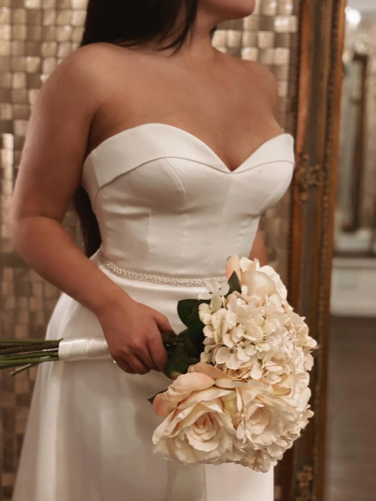 Strapless sweetheart bridal gown with slipper satin skirt