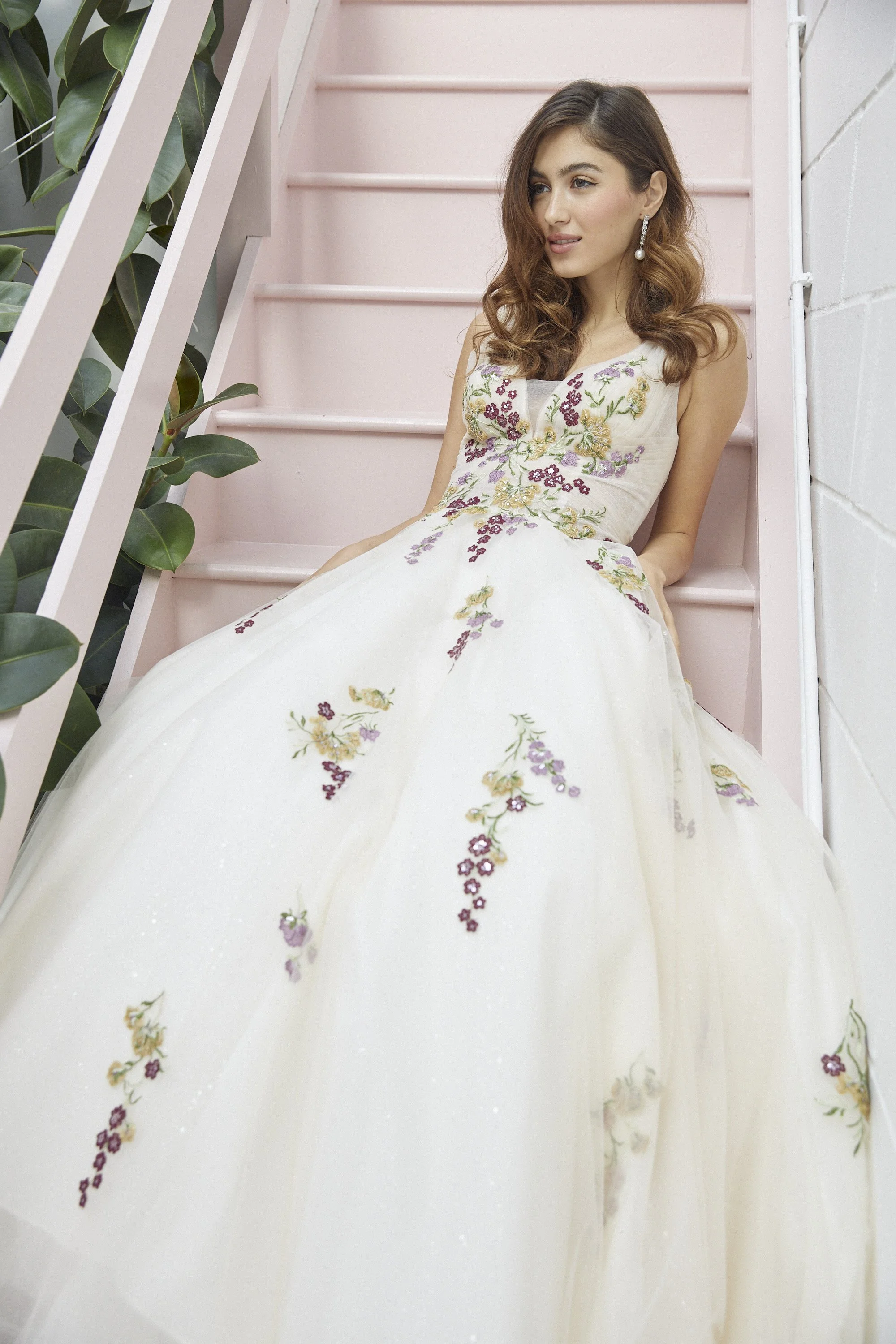 V-neck, v-back wedding dress in embroidered tulle with mulberry, lilac & gold floral appliqués 