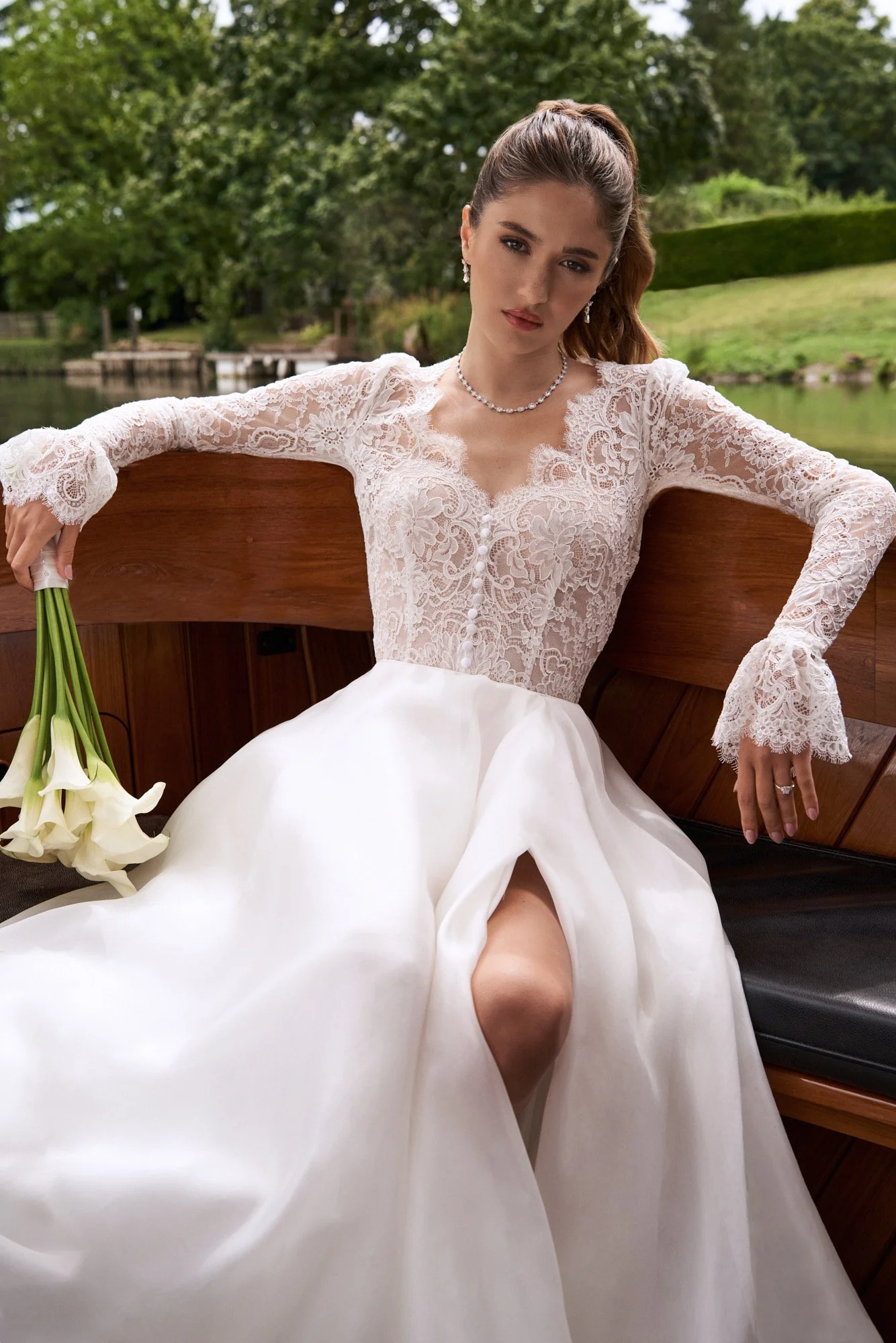 Lace bodice with internal corset and silk organza skirted wedding dress