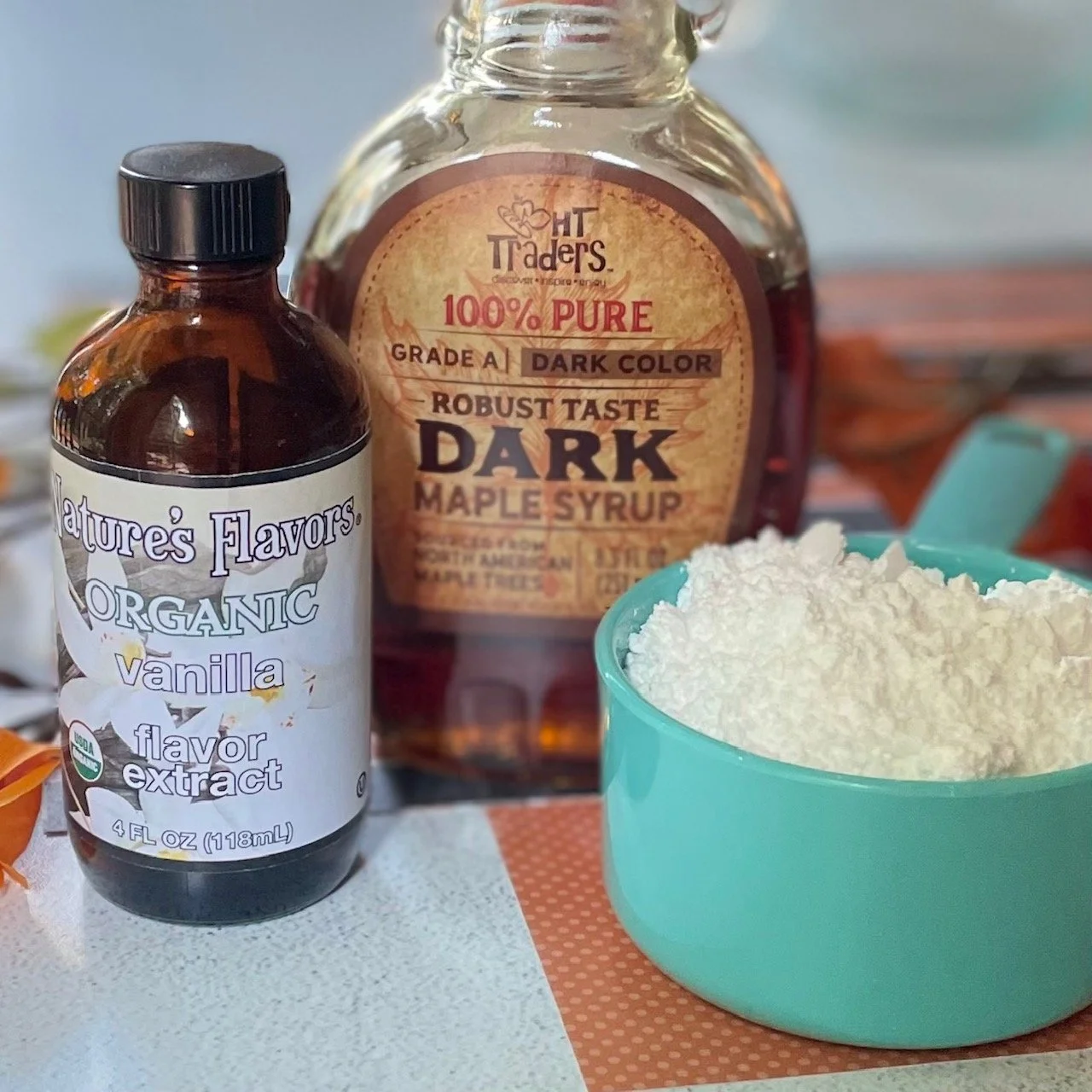 Ingredients for maple glaze for pumpkin cookies for fall.