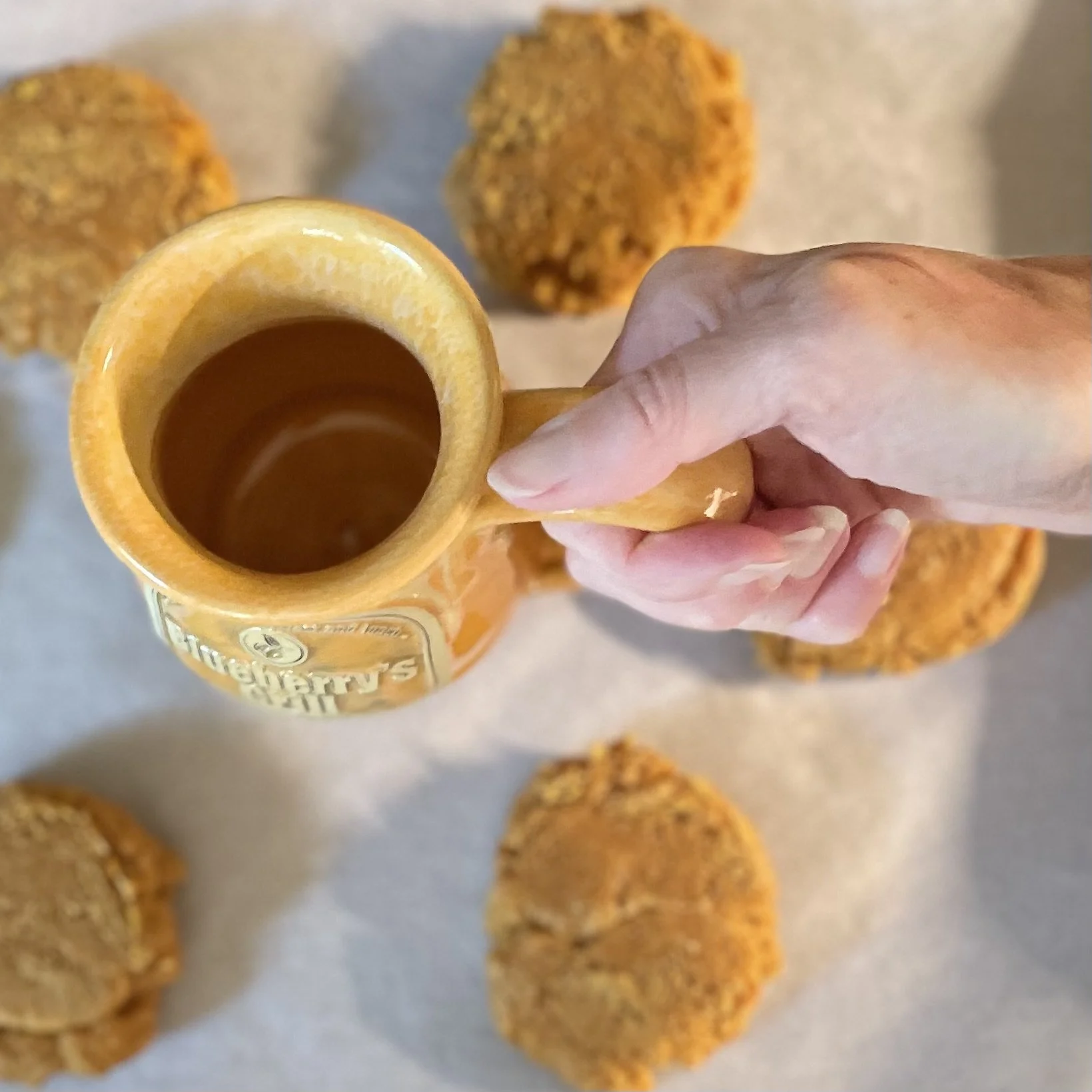 Why do you smash down peanut butter cookie dough? Using bottom of a mug to smash down peanut butter pumpkin cookies to cook evenly.
