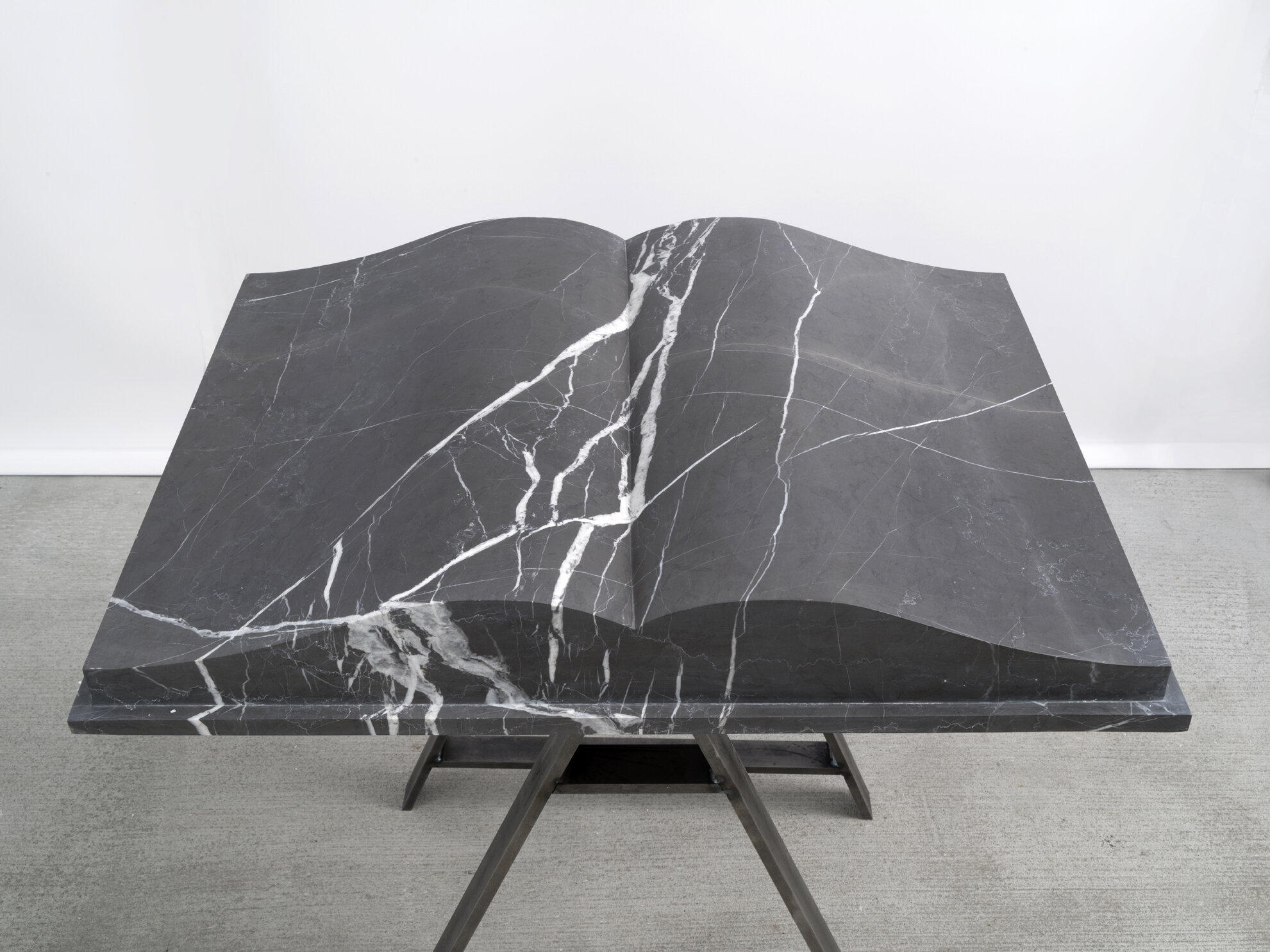   Touch me not , 2016 graphite stone, pedestal 27.5 × 35.5 x 5.5 inches (70 × 90 x 13 cm) 