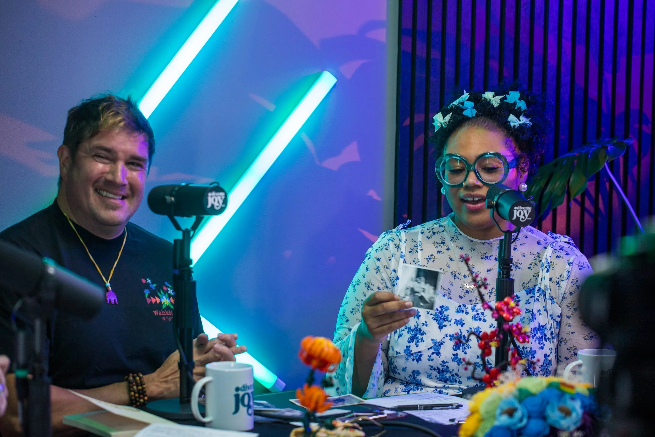 Jack Pepple with Amber Nelson, while reviewing photos of Jack's Native American ancestry