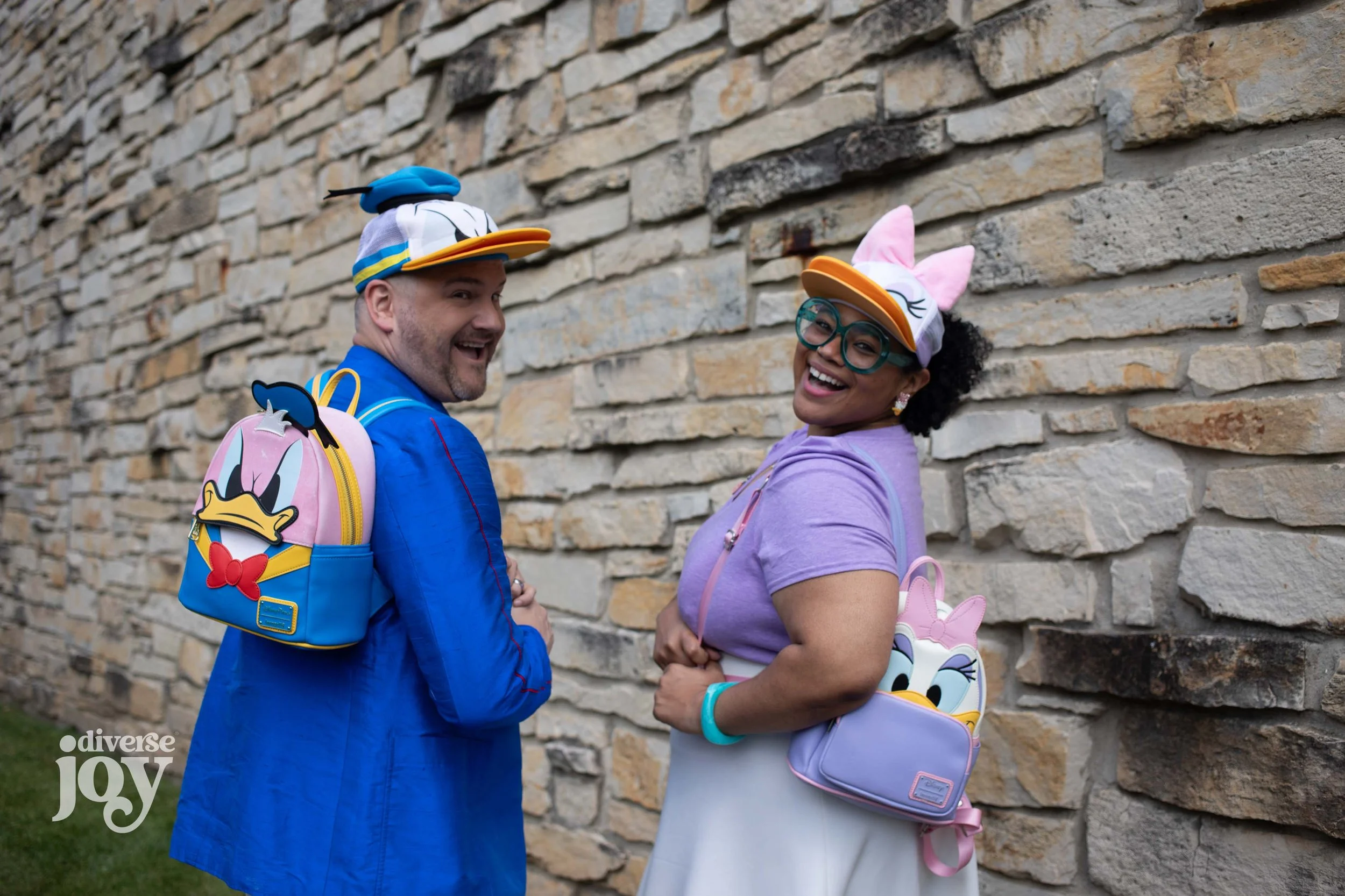 Dr William T L Cox and Dr Amber Nelson pose for a photo while Disneybounding as Donald and Daisy Duck