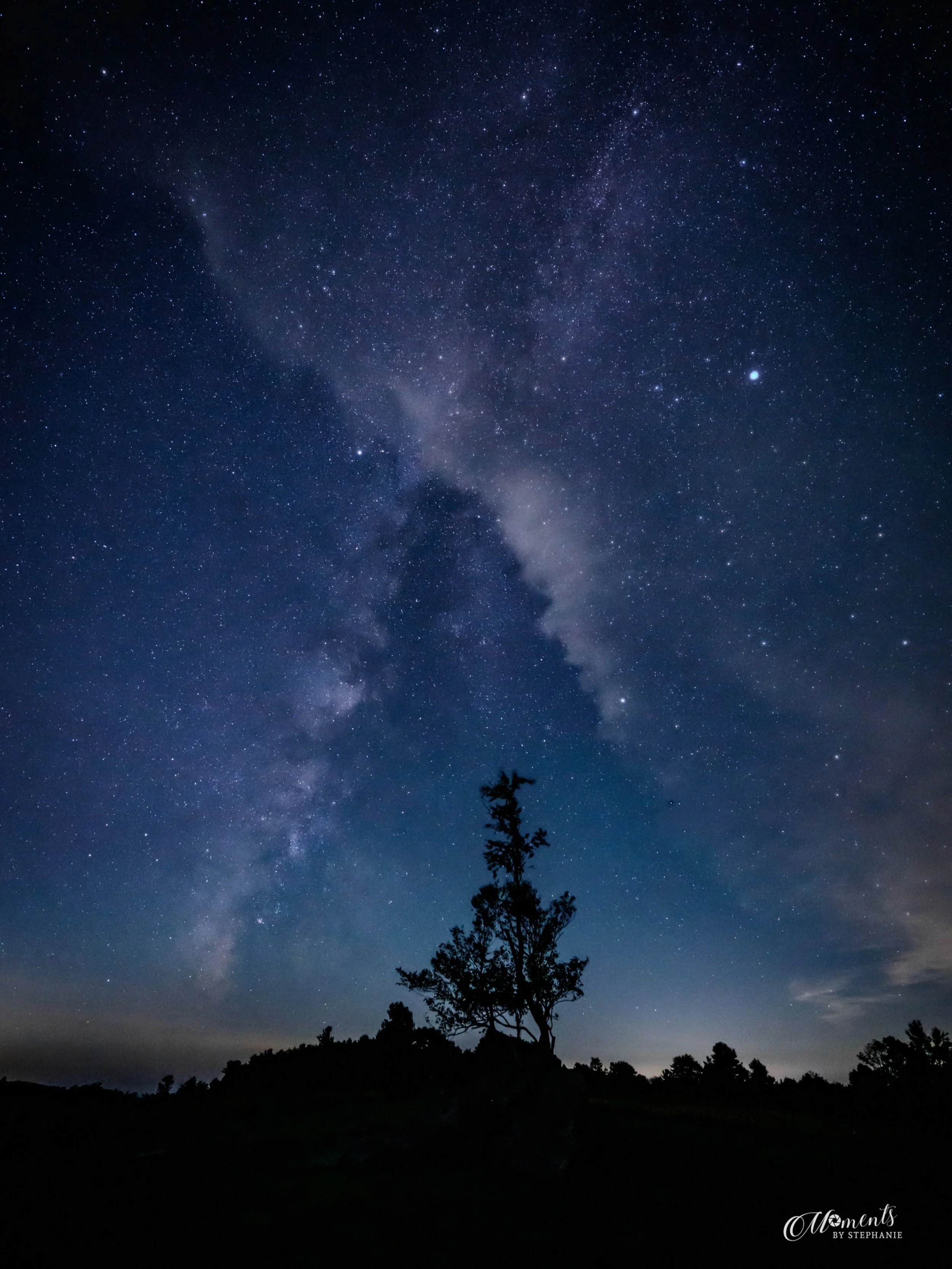 Sometimes, the most extraordinary moments happen when two worlds meet.

On this night at Doughton Park, a passing cloud crossed the Milky Way, creating an unexpected celestial crossing above the Blue Ridge. For just a brief moment, the stars, the clo