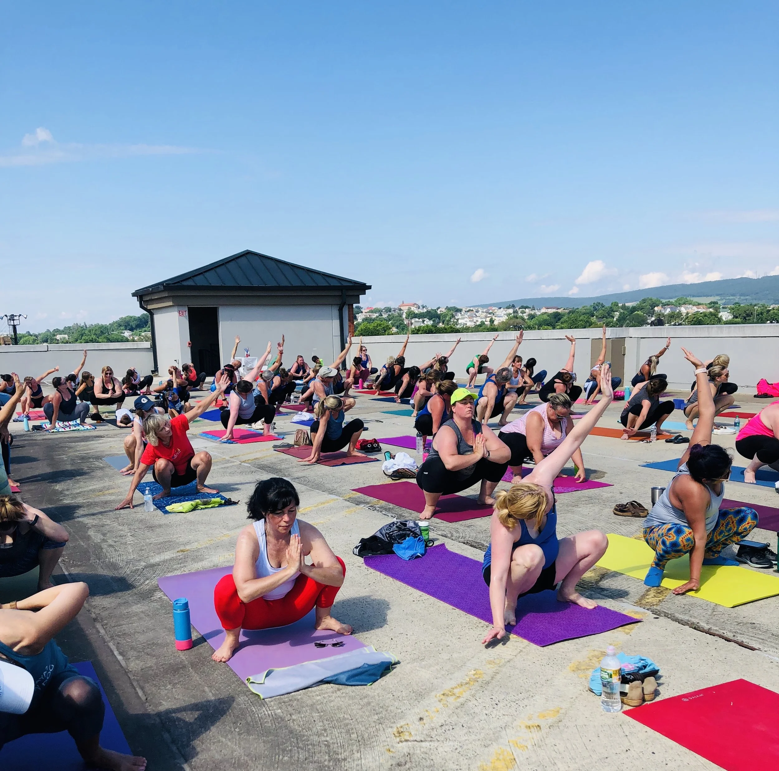 malasana-yoga-squat-yoga-on-the-roof-marketplace-at-steamtown-jaya-yoga-studio-scranton-pa.jpg