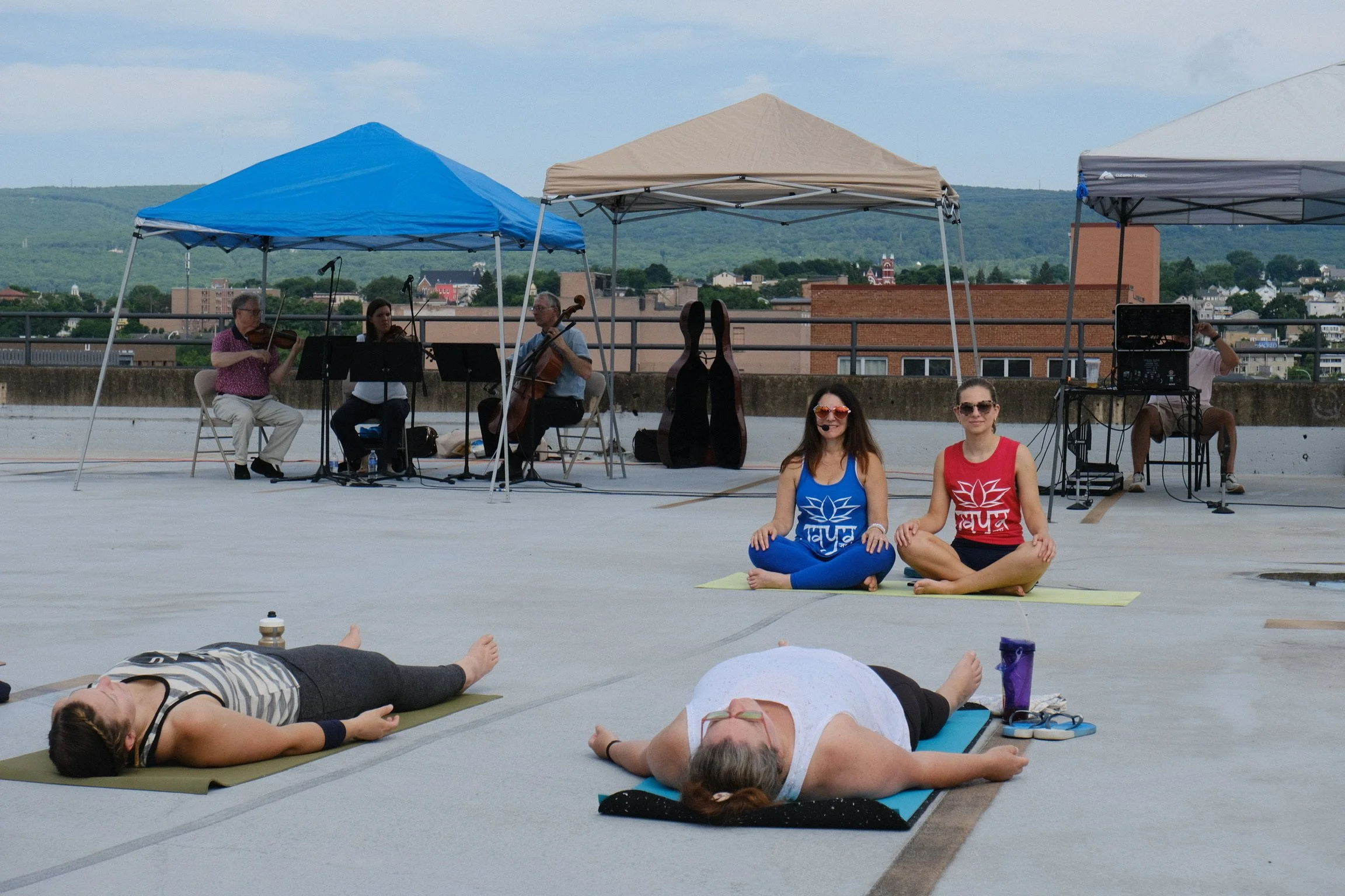 jaya-yoga-studio-hilary-lily-philharmonic-savasana-yoga-on-the-roof-scranton-2026.jpg